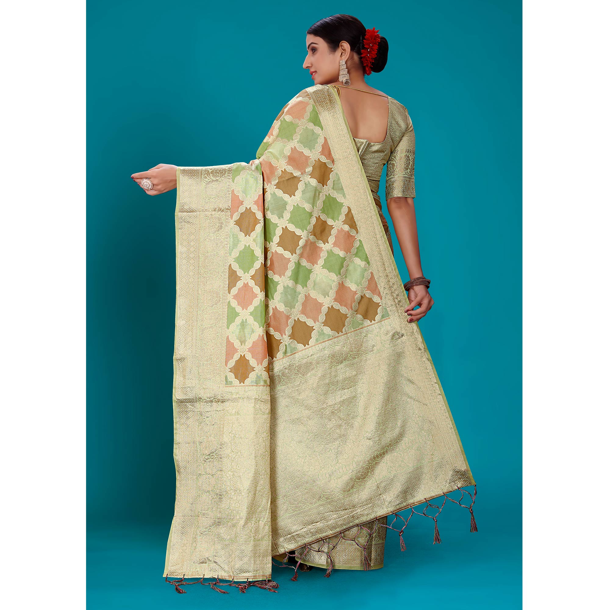 Green Woven Organza Saree With Tassels