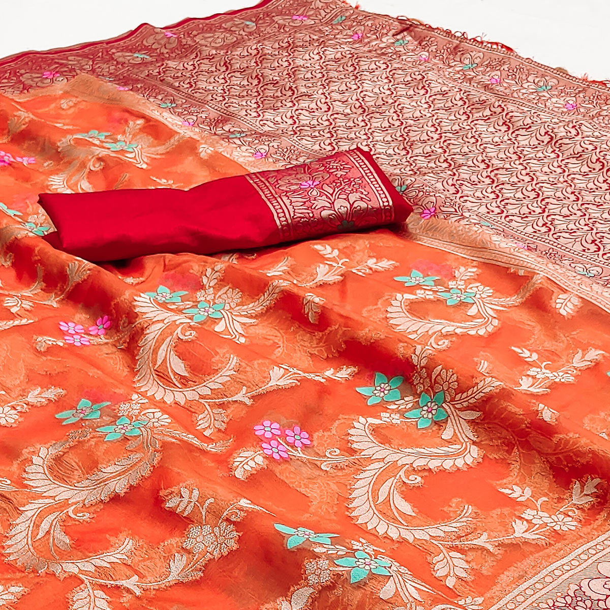 Orange Floral Woven Organza Saree With Tassels