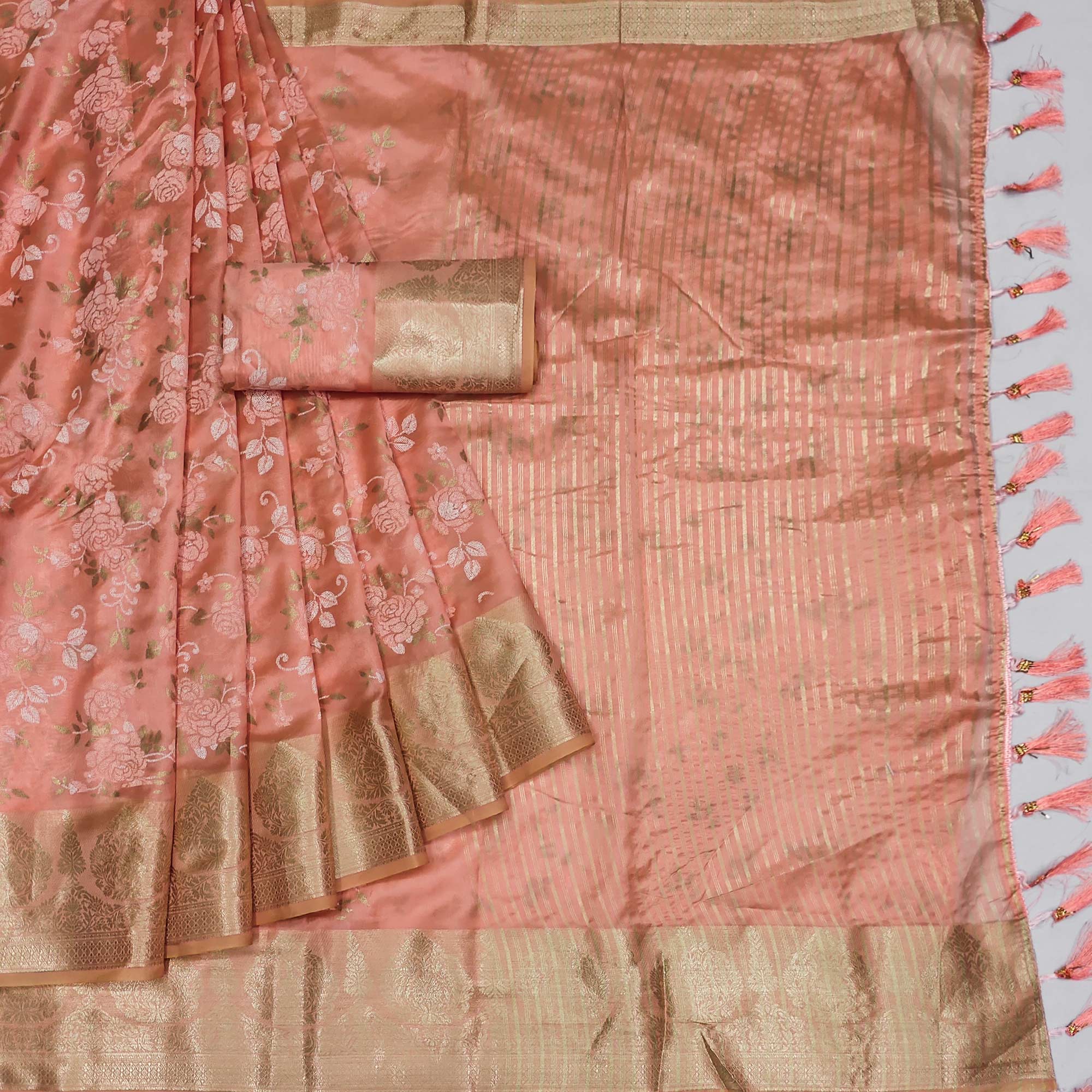 Peach Woven Organza Saree With Tassels