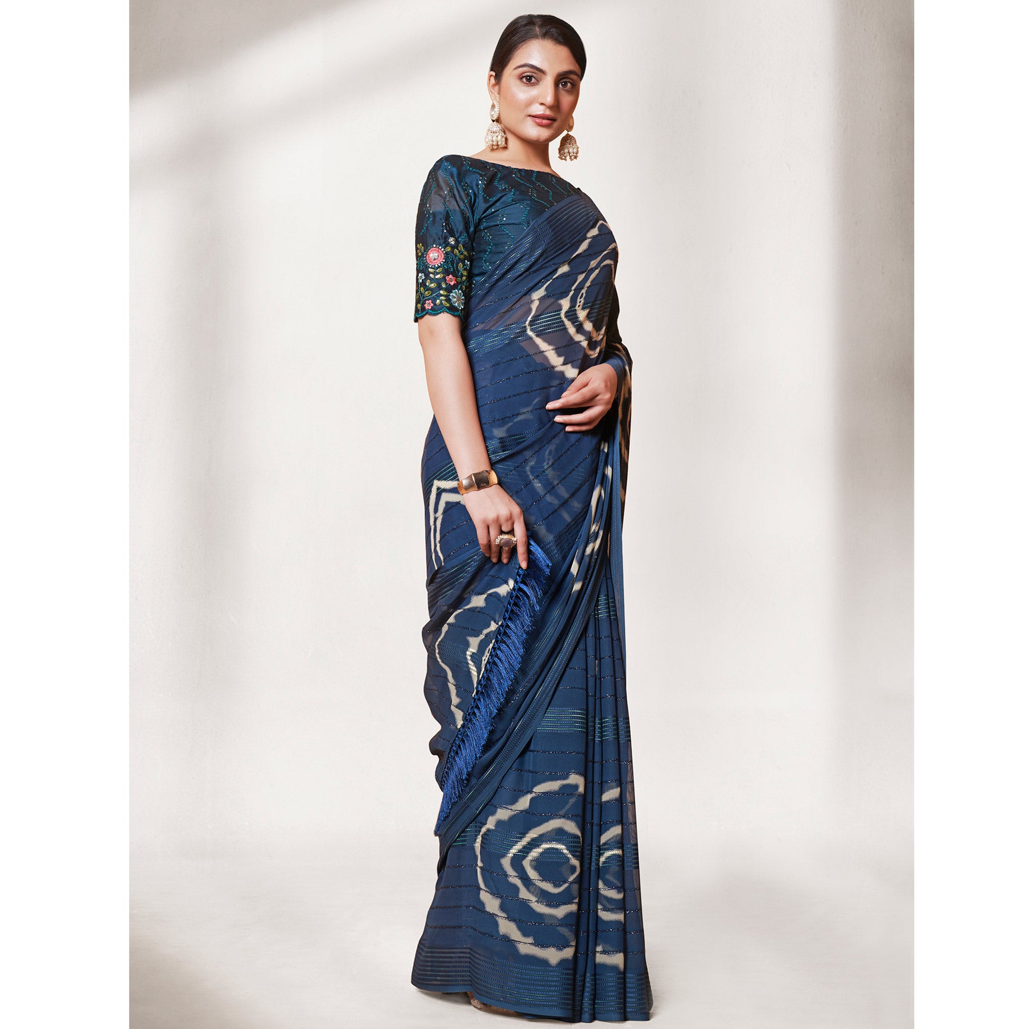 Teal Blue Printed Wiht Embroidered Georgette Saree