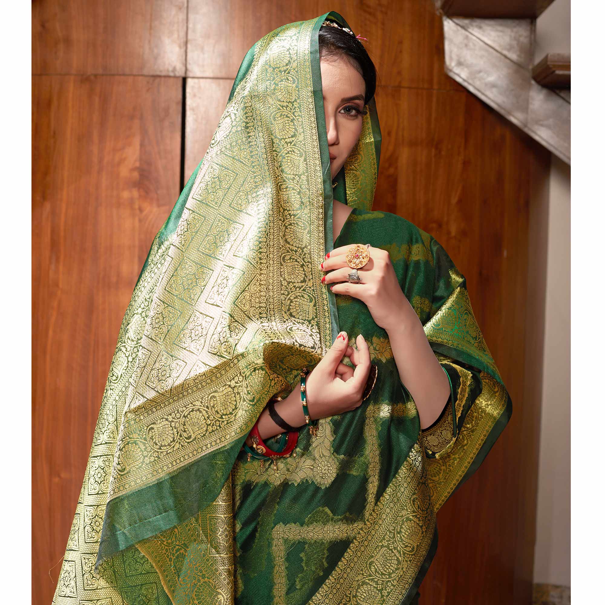 Bottle Green Woven Organza Saree