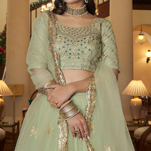 Pista Green Sequins Embroidered Netted Lehenga Choli