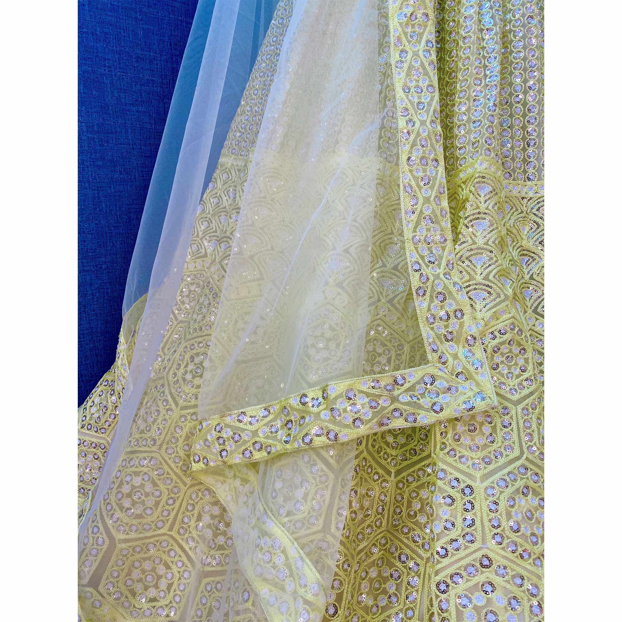 Lemon Yellow Sequins Embroidered Netted Lehenga Choli