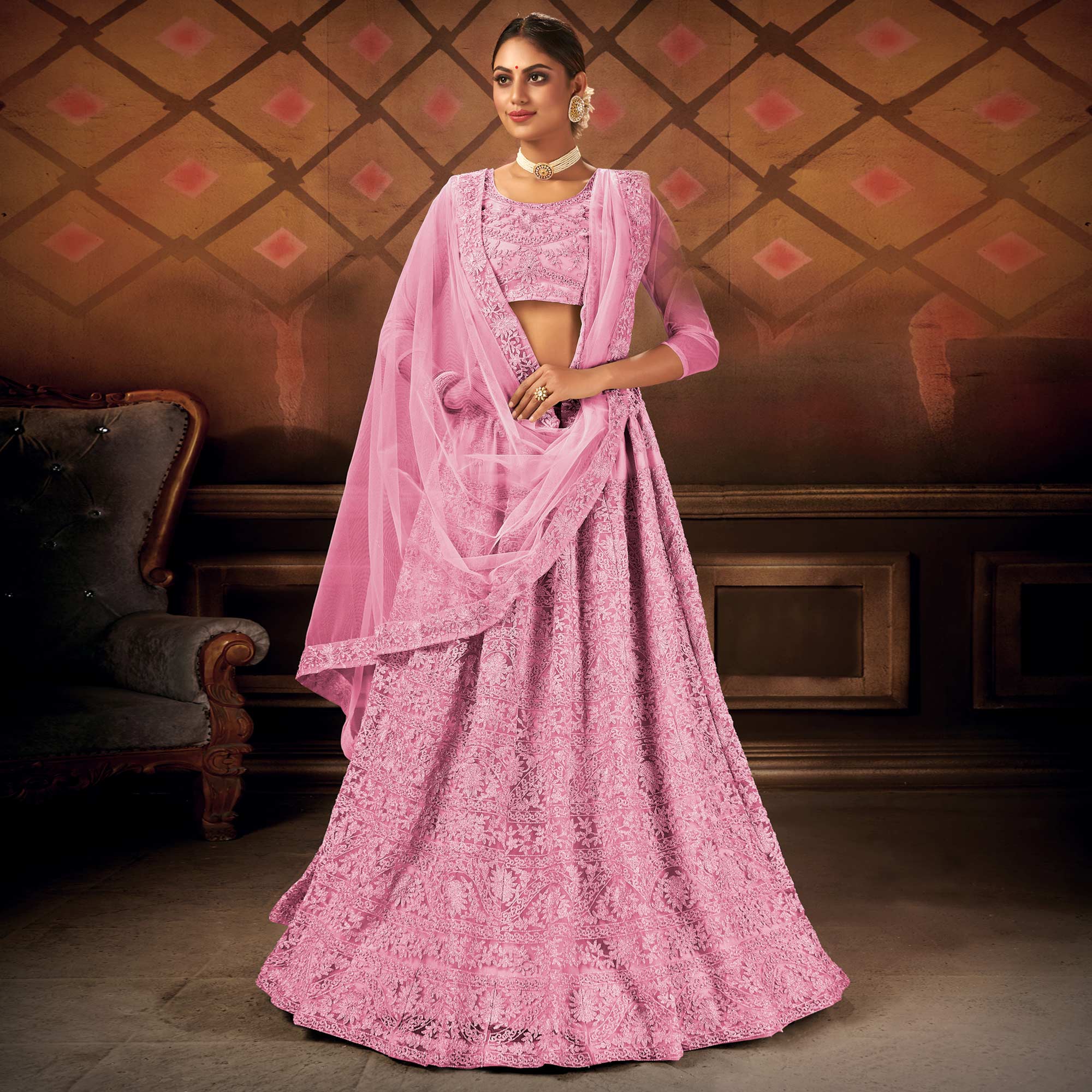 Pink Embroidered Netted Lehenga Choli