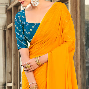 Mustard Printed Georgette Saree With Tassels