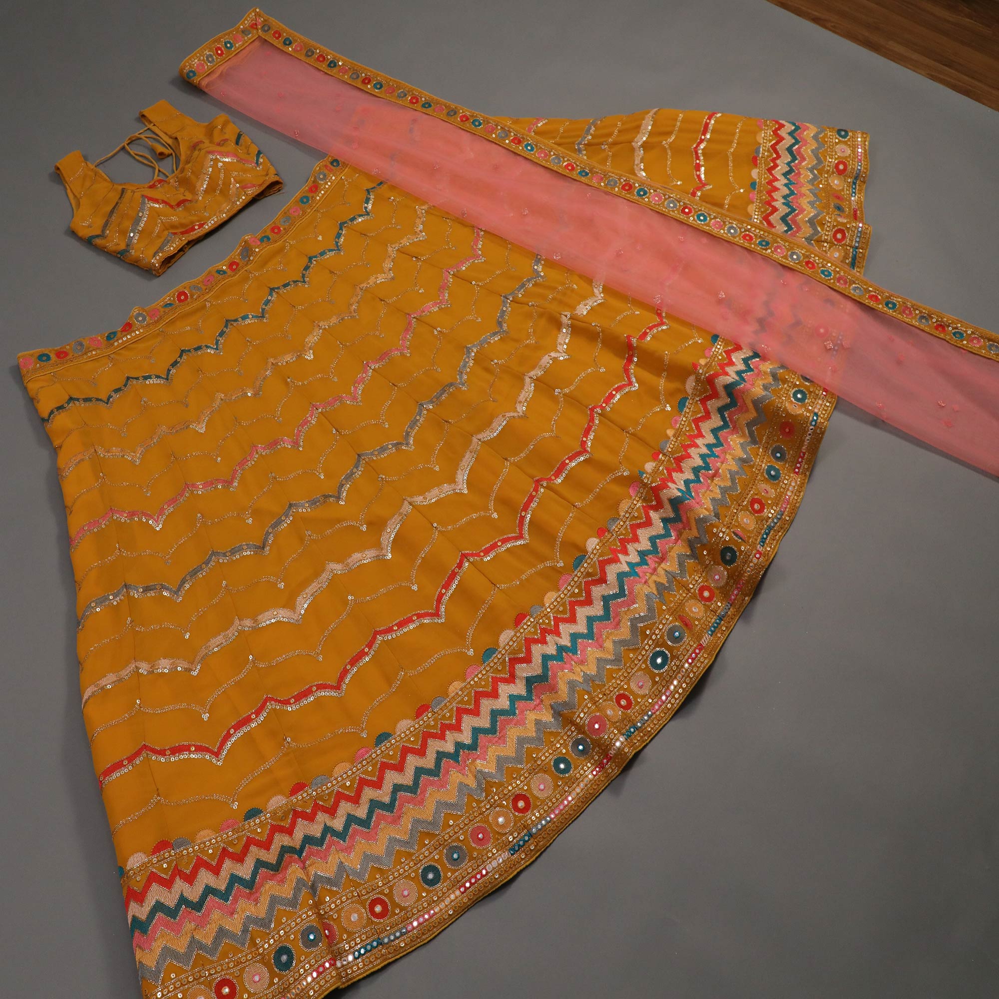 Mustard Sequins Embroidered Georgette Lehenga Choli
