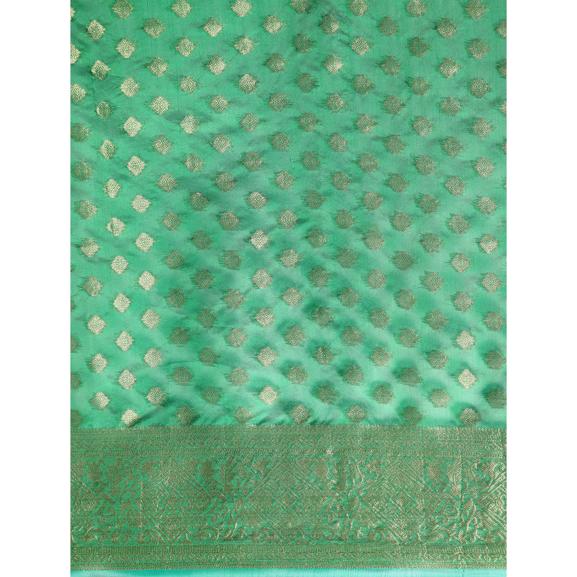 Green Woven Organza Silk Saree With Tassels