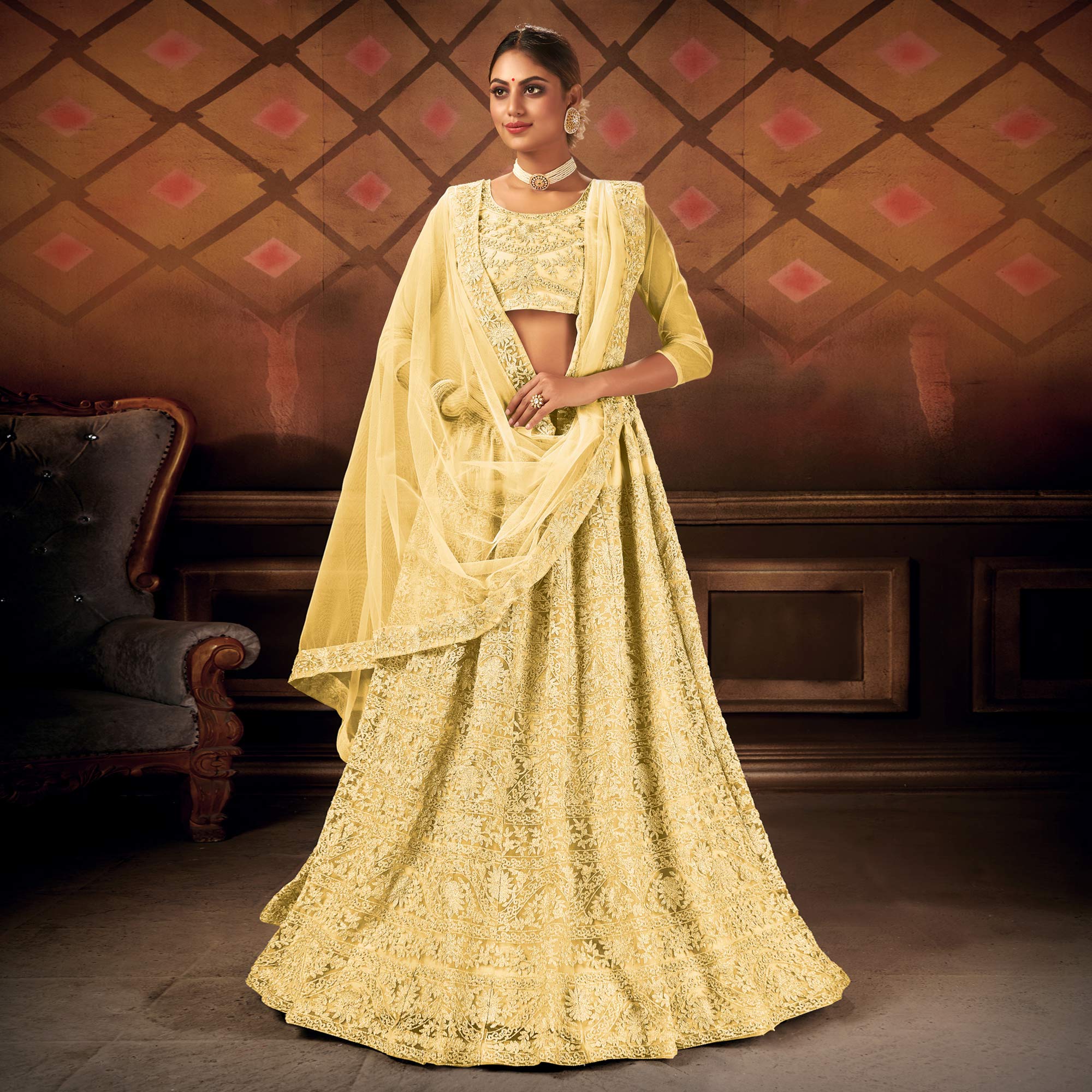 Yellow Embroidered Netted Lehenga Choli