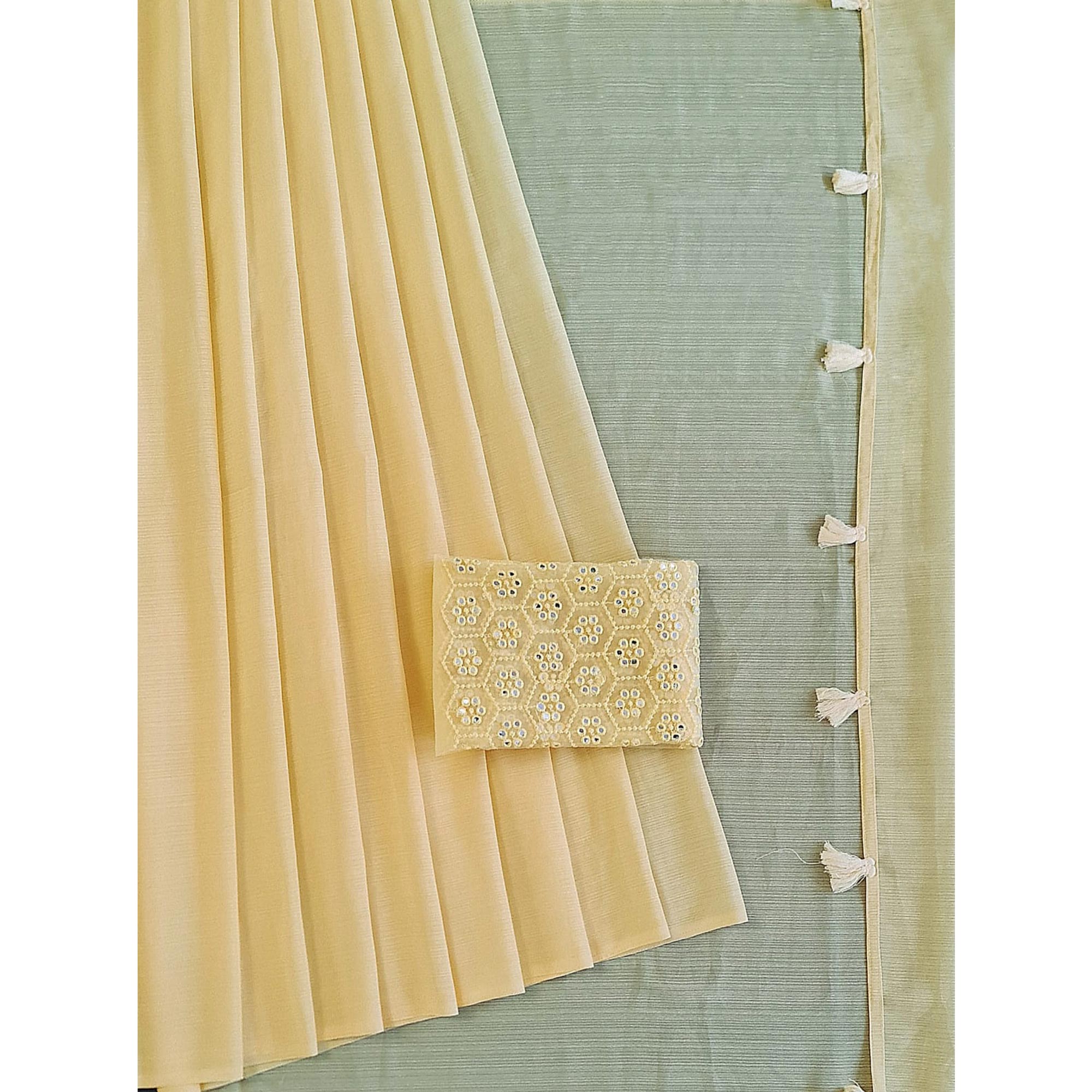 Light Yellow Solid Chiffon Saree With Tassels
