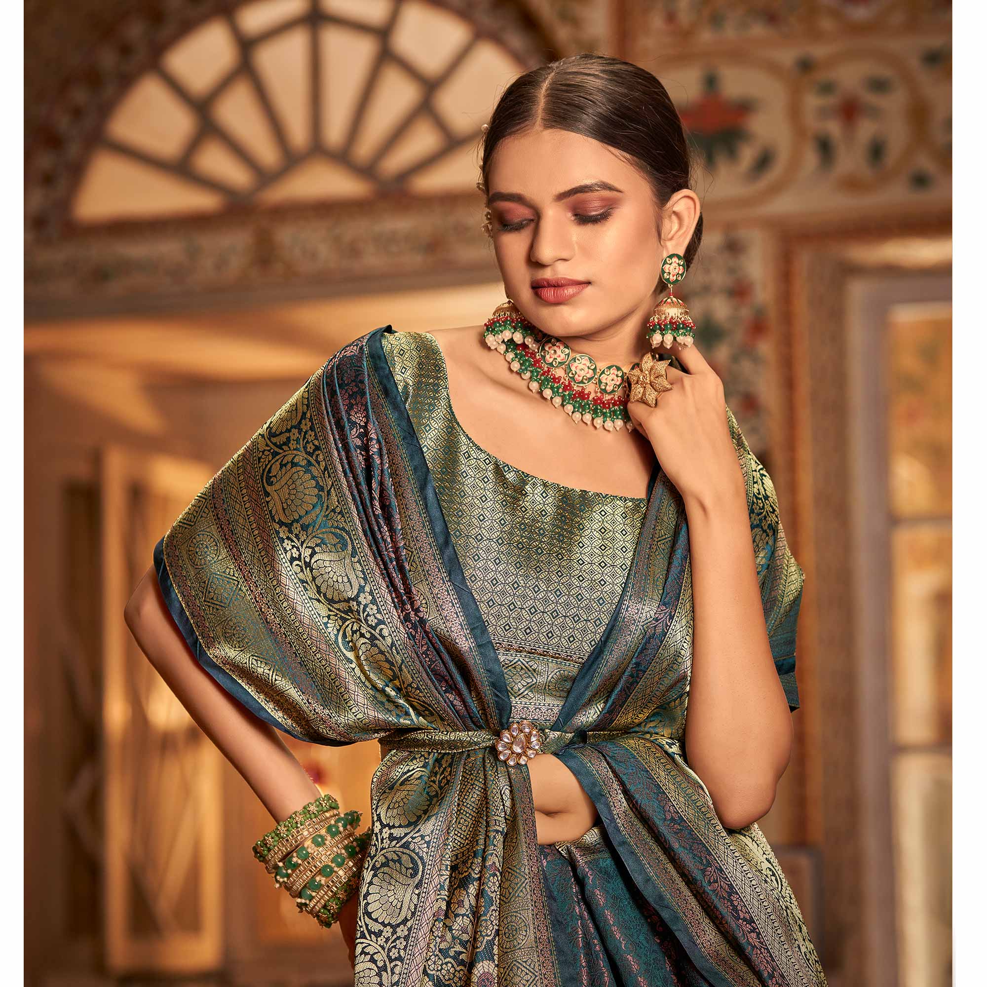 Teal Blue Floral Woven Kanjivaram Silk Saree