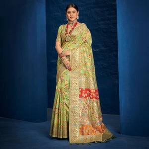 Green Woven Art Silk Saree With Tassels