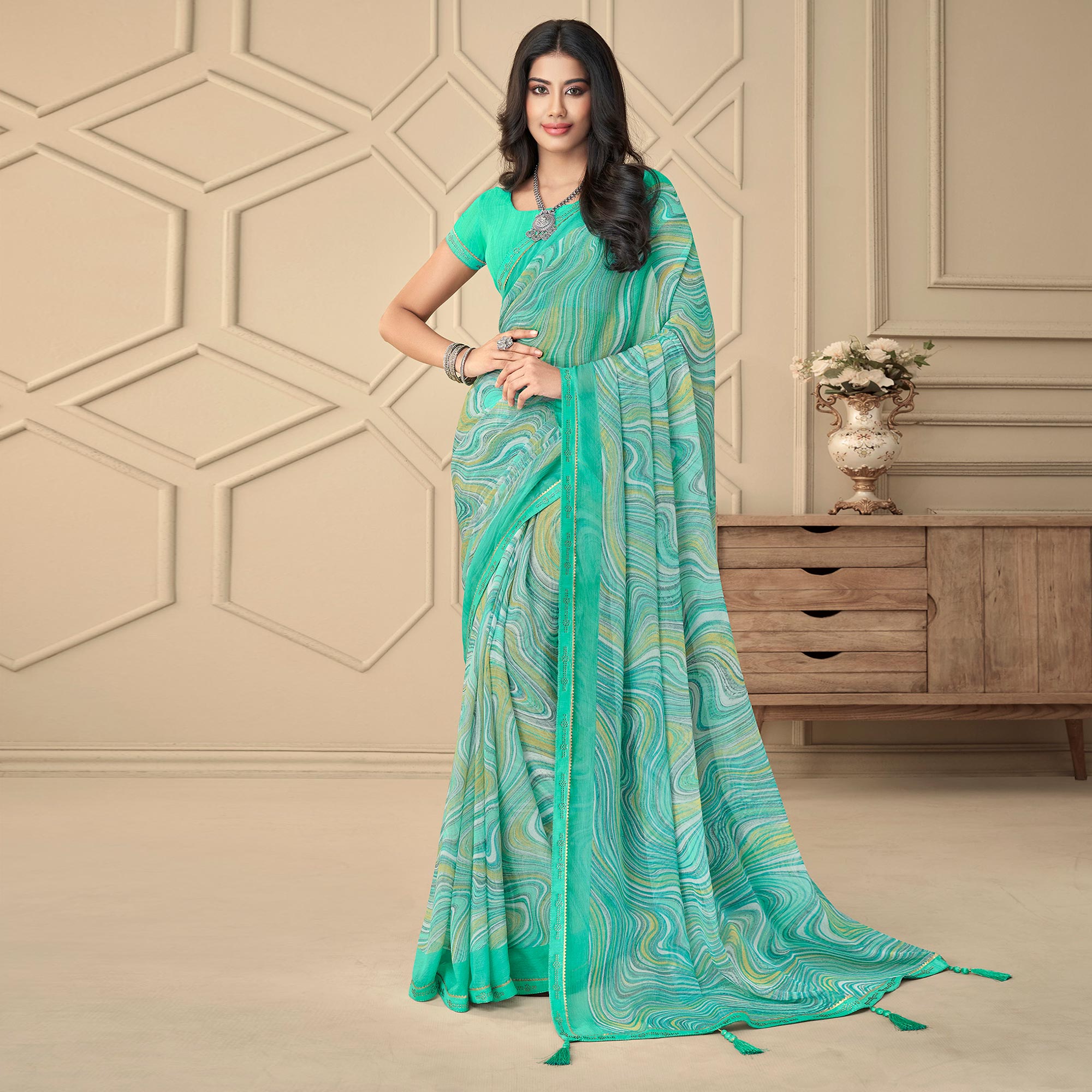 Turquoise Printed Chiffon Saree With Tassels