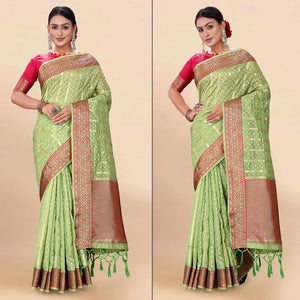Green Woven Organza Saree With Tassels