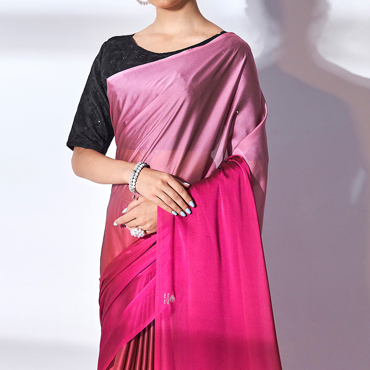 Pink Solid Georgette Saree With Tassels