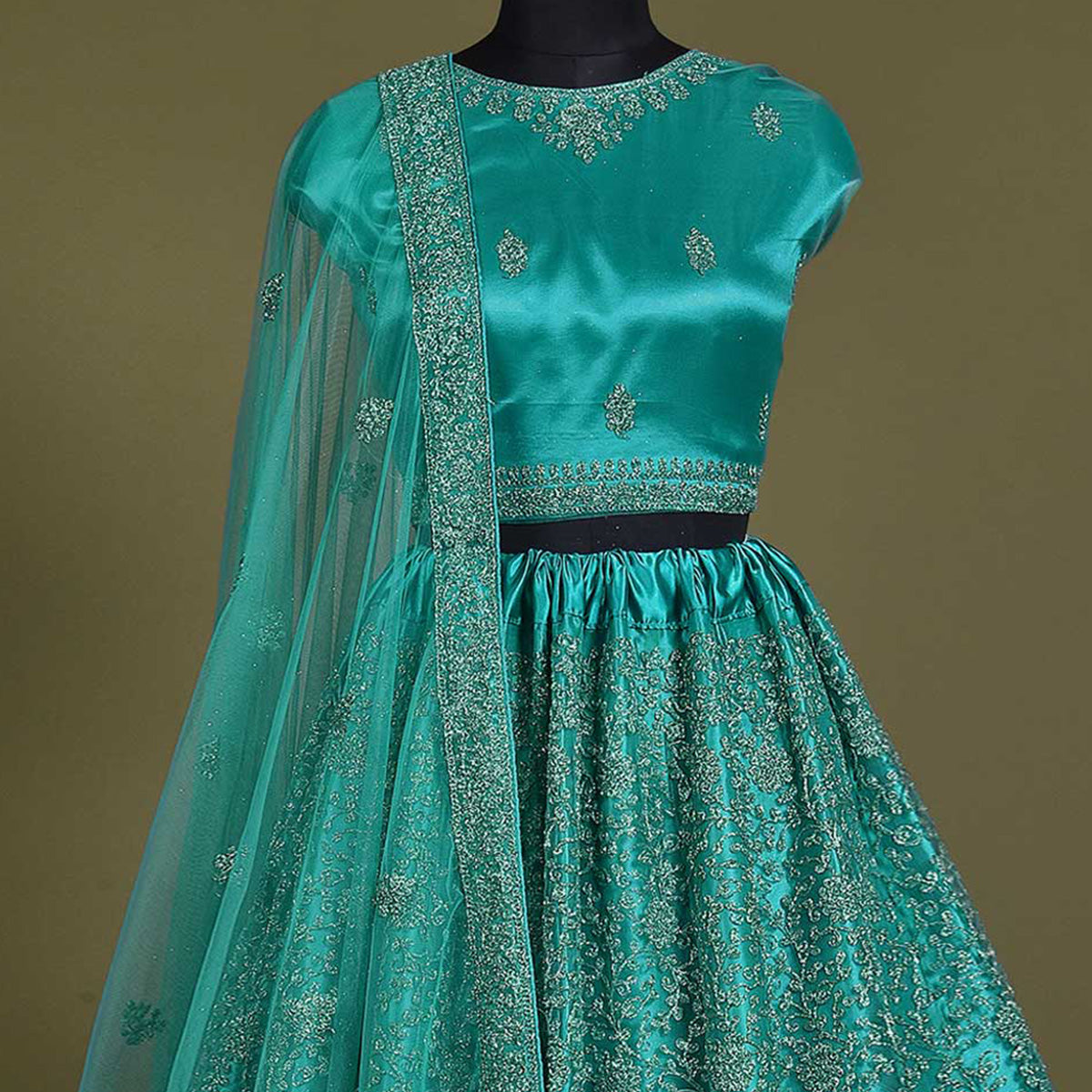 Turquoise Floral Embroidered Net Lehenga Choli