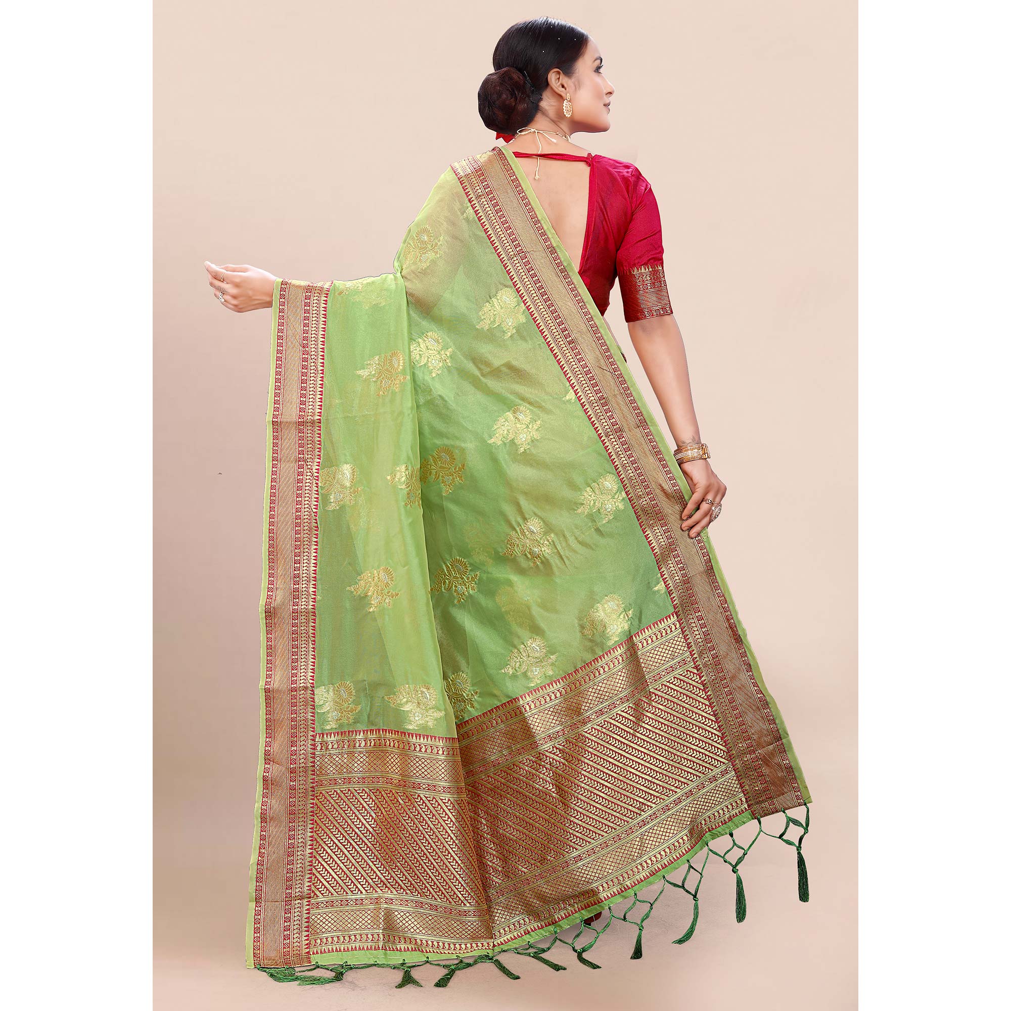 Green Woven Organza Saree With Tassels