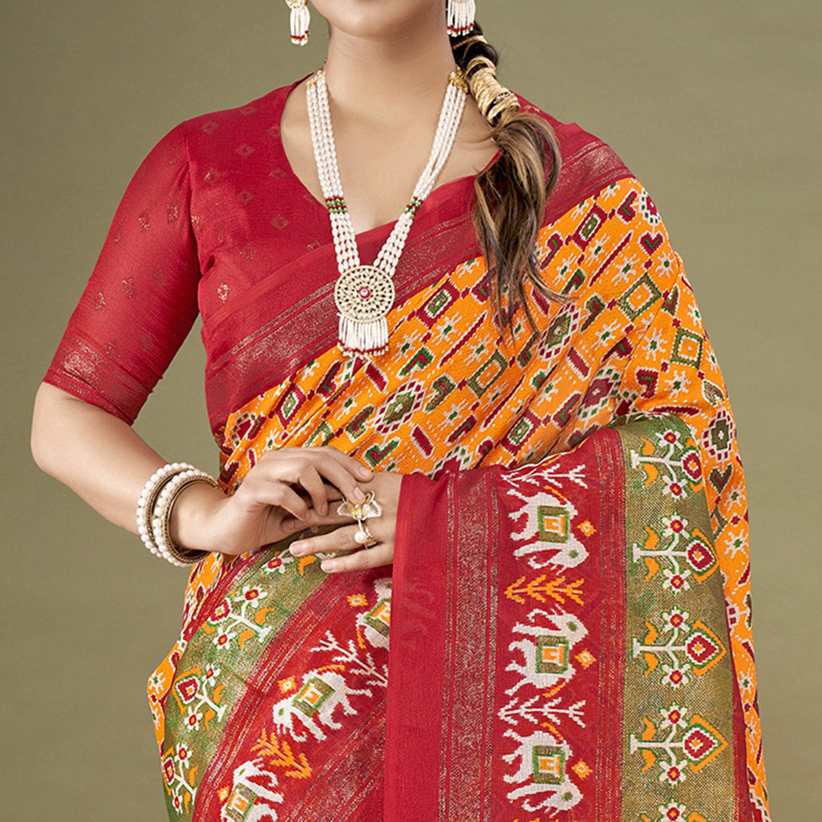 Orange Printed Jute Patola Saree