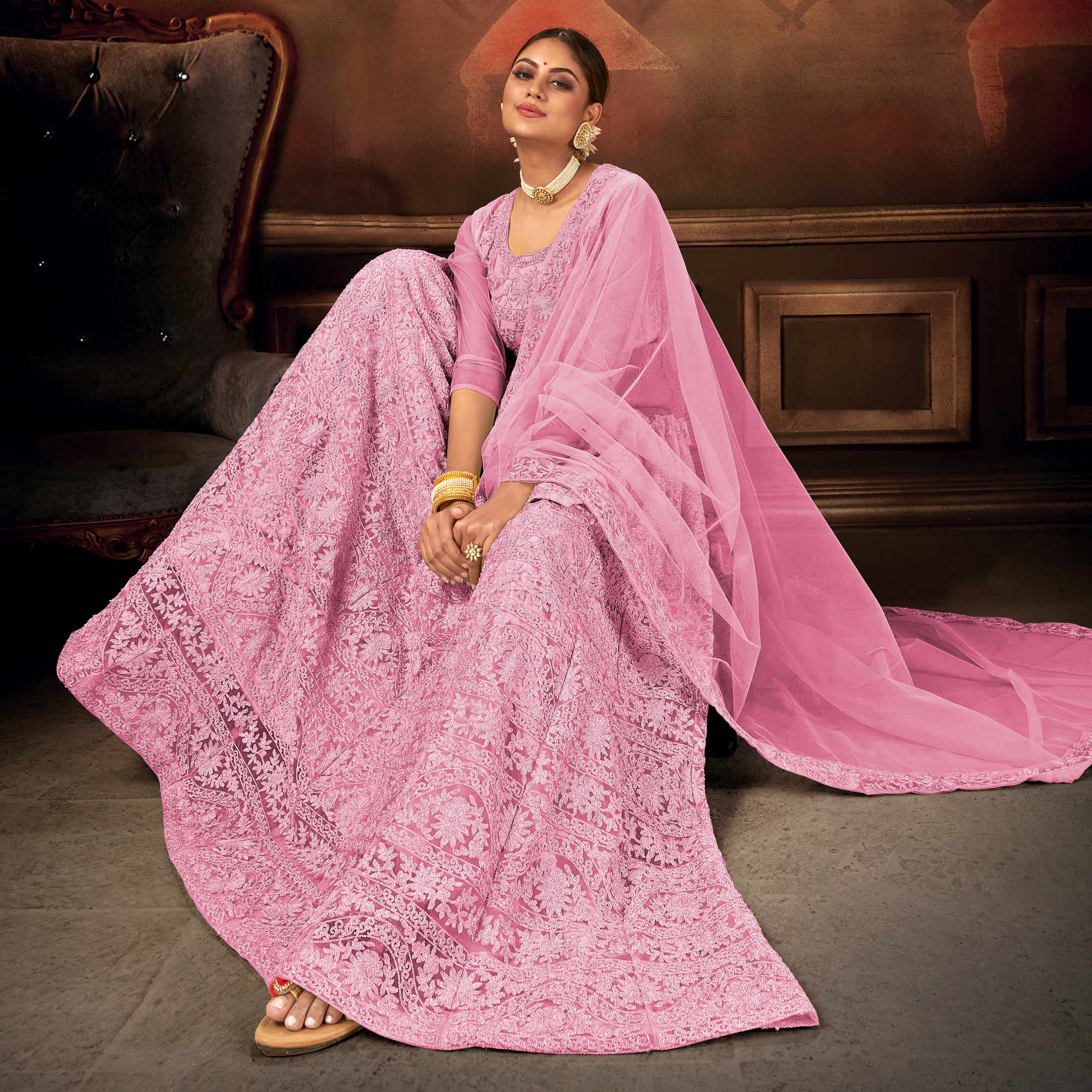 Pink Embroidered Netted Lehenga Choli