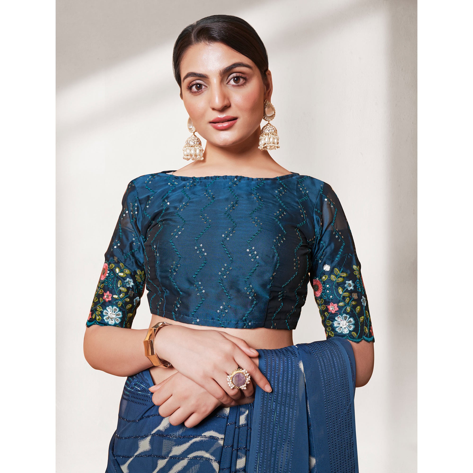 Teal Blue Printed Wiht Embroidered Georgette Saree