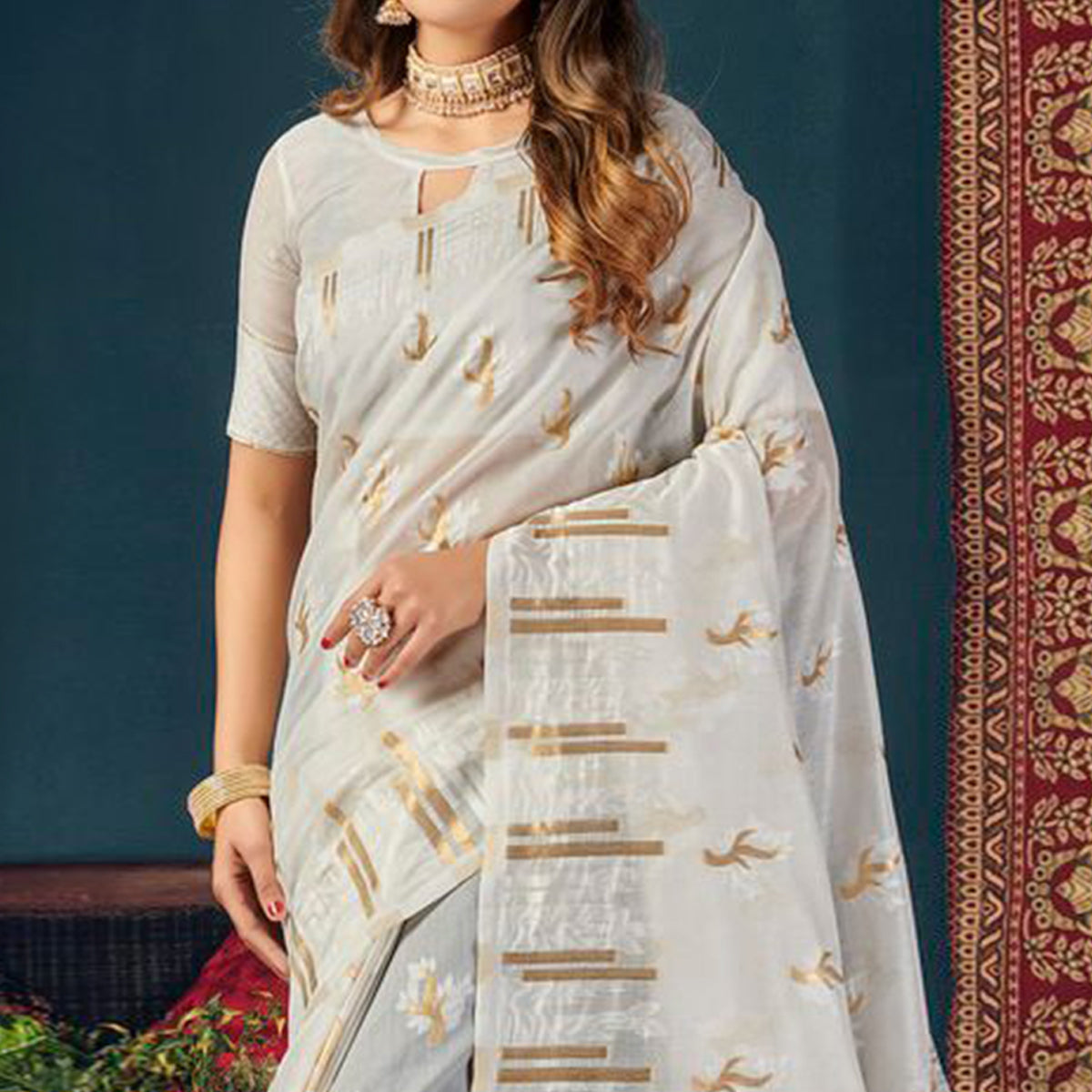 White Woven Cotton Blend Saree With Tassels