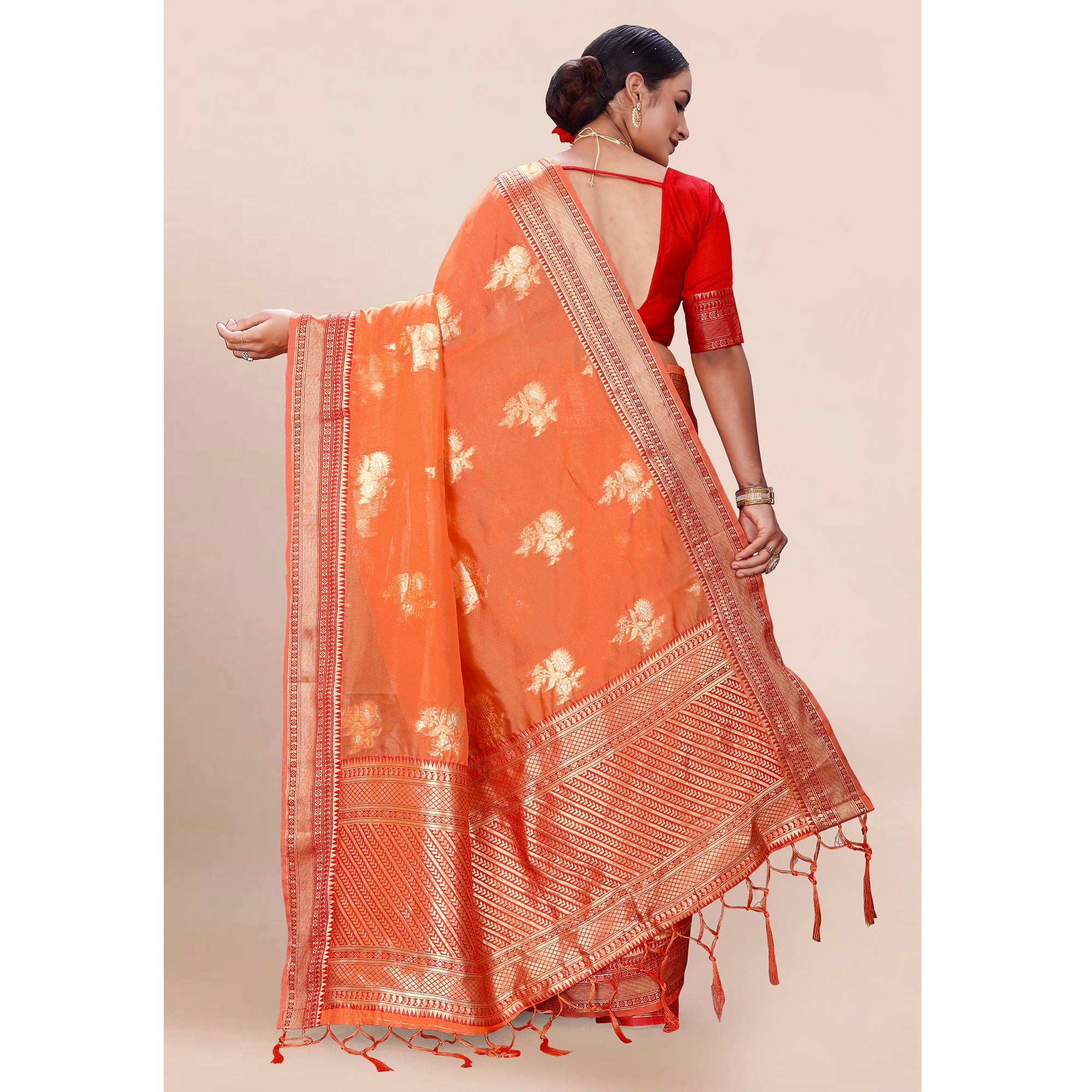 Orange Woven Organza Saree With Tassels