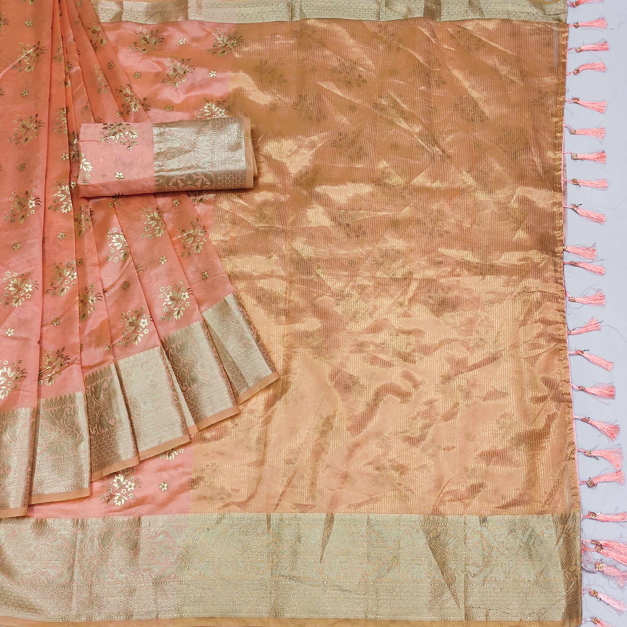 Peach Woven Organza Saree With Tassels