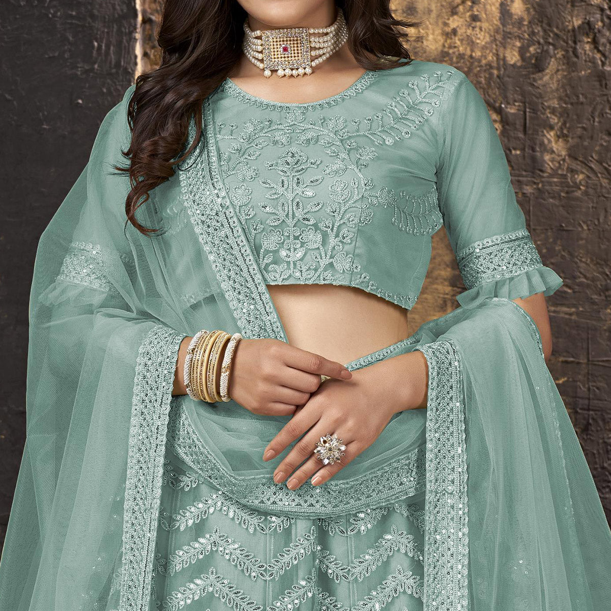Sea Blue Heavy Embroidered Netted Lehenga Choli