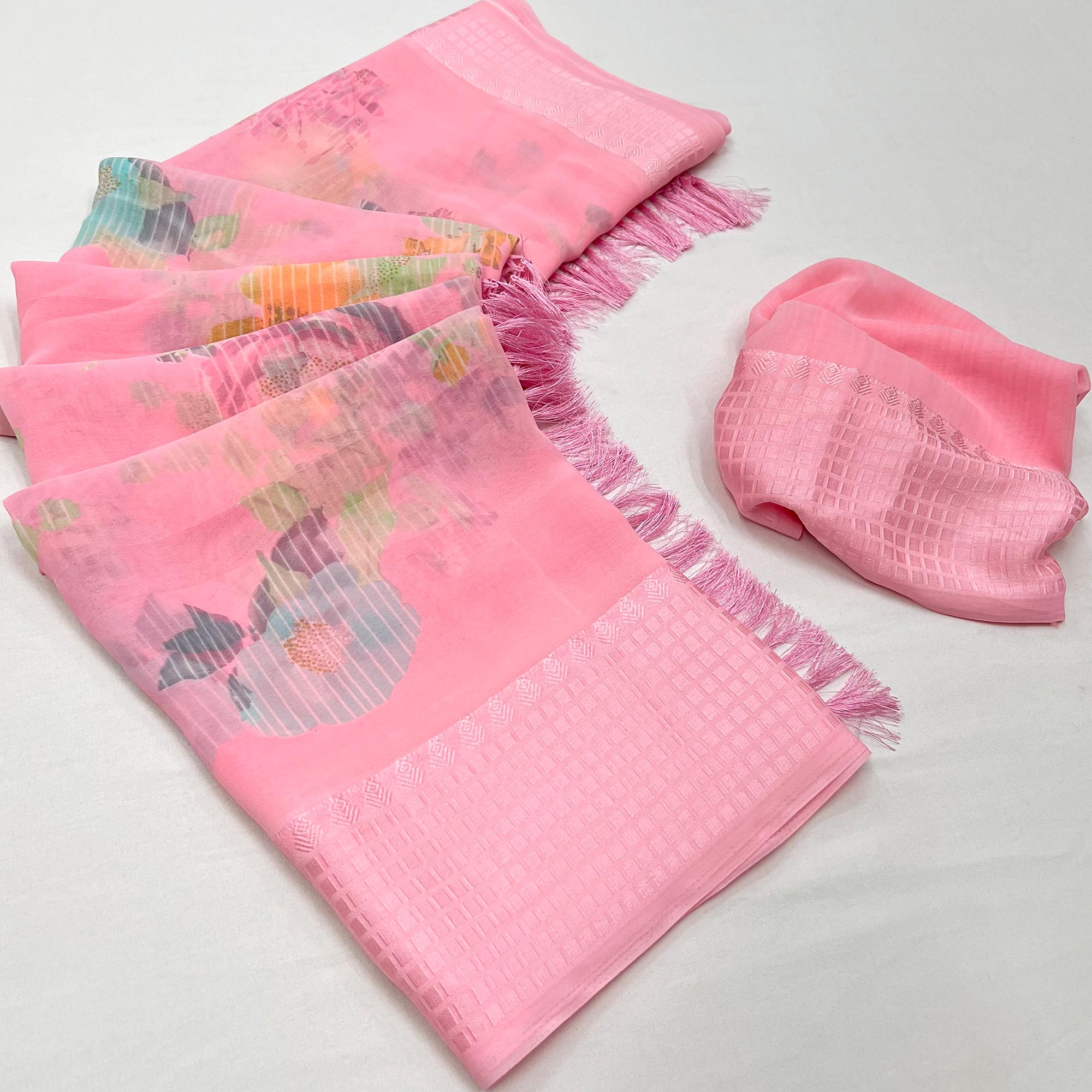 Pink Floral Printed Georgette Saree With Tassels