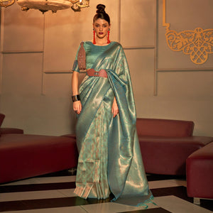 Light Pista Green Woven Art Silk Saree With Tassels