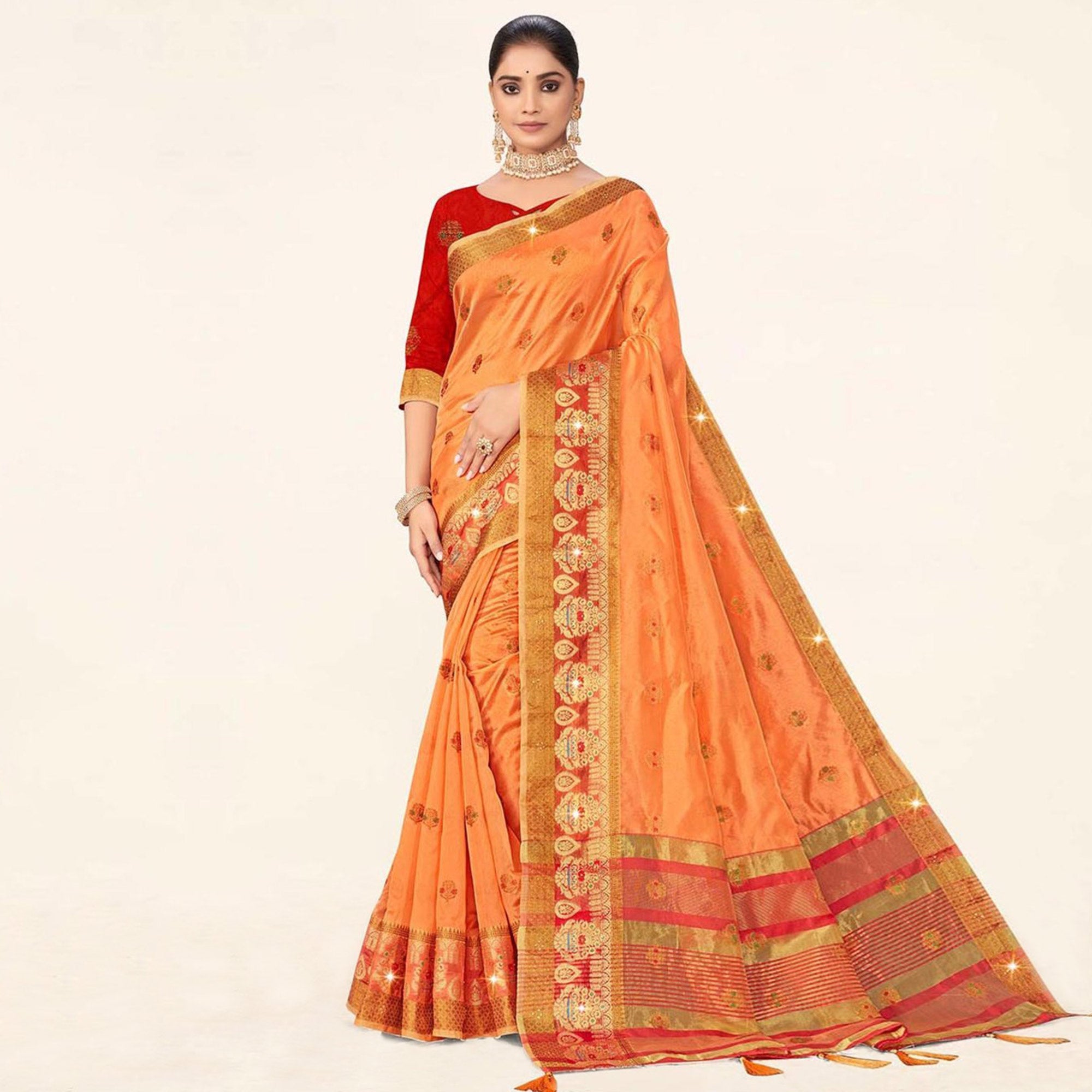 Orange Woven Organza Saree With Tassels