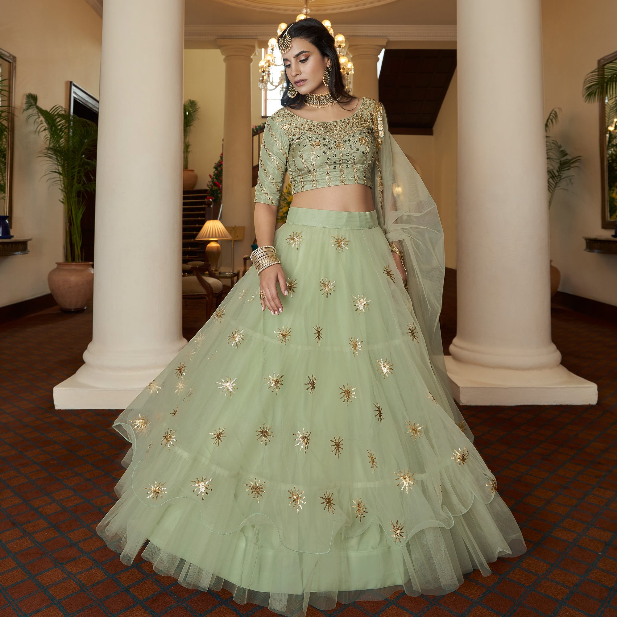 Pista Green Sequins Embroidered Netted Lehenga Choli