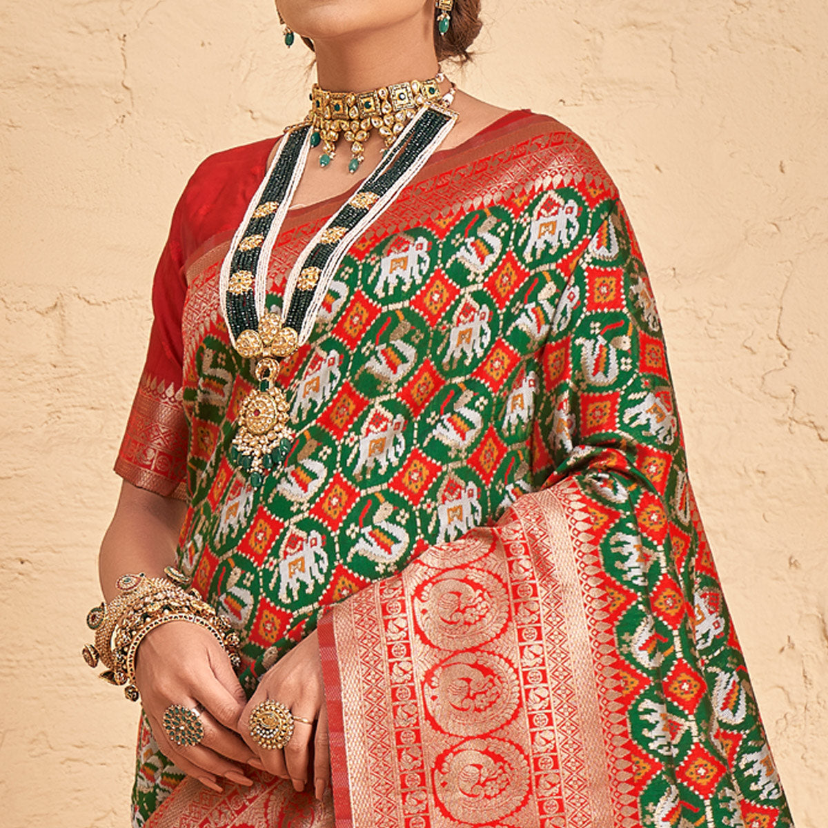 Green Woven Patola Art Silk Saree With Tassels