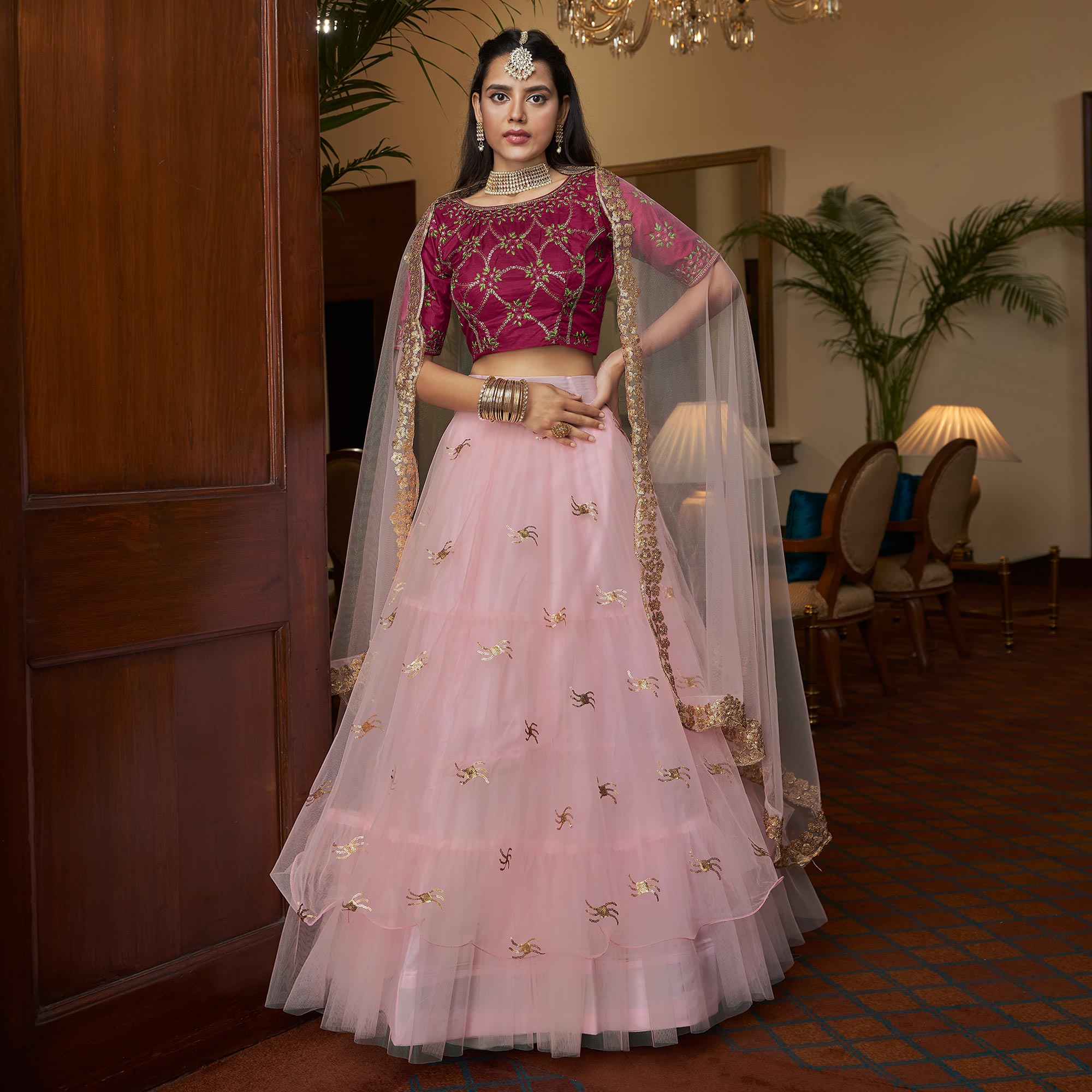 Baby Pink Sequins Embroidered Netted Lehenga Choli