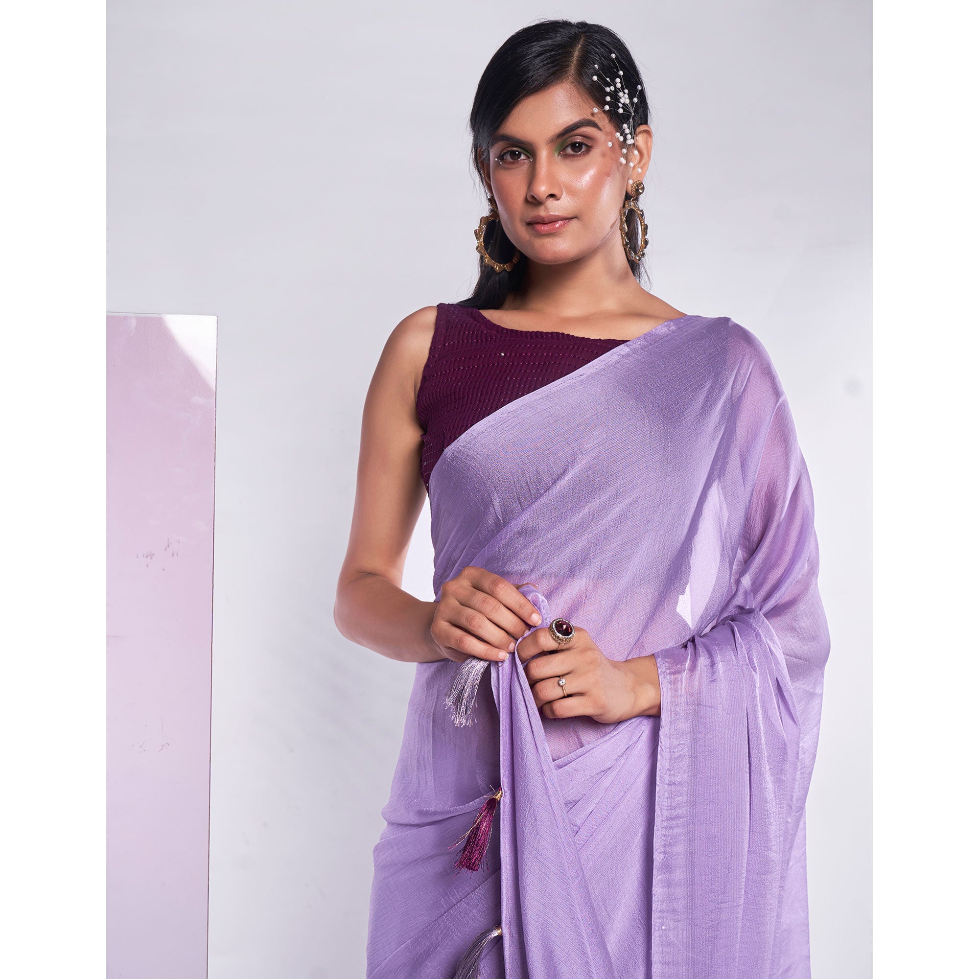 Purple Solid Georgette Saree With Tassels