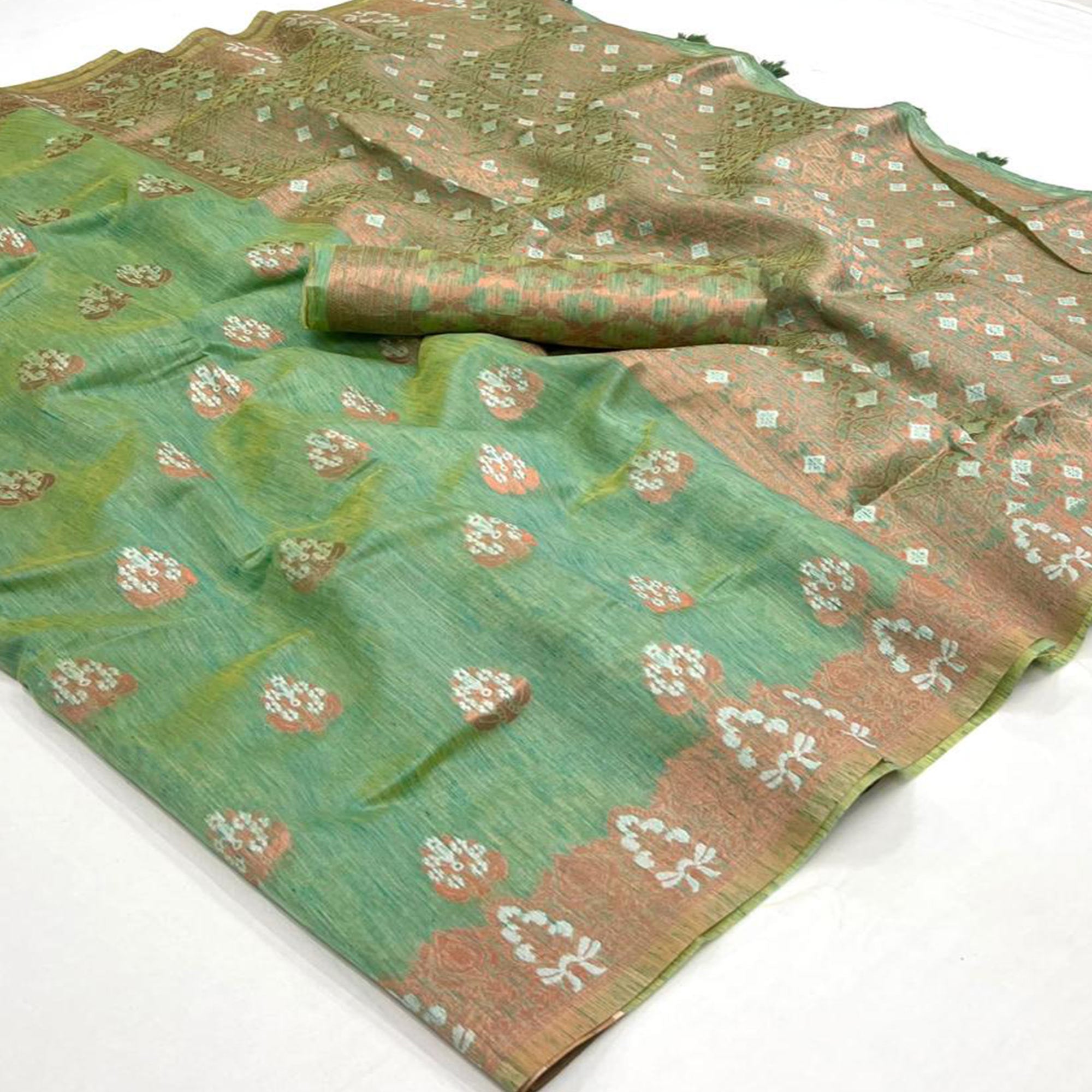 Pista Green Woven Linen Saree With Tassels
