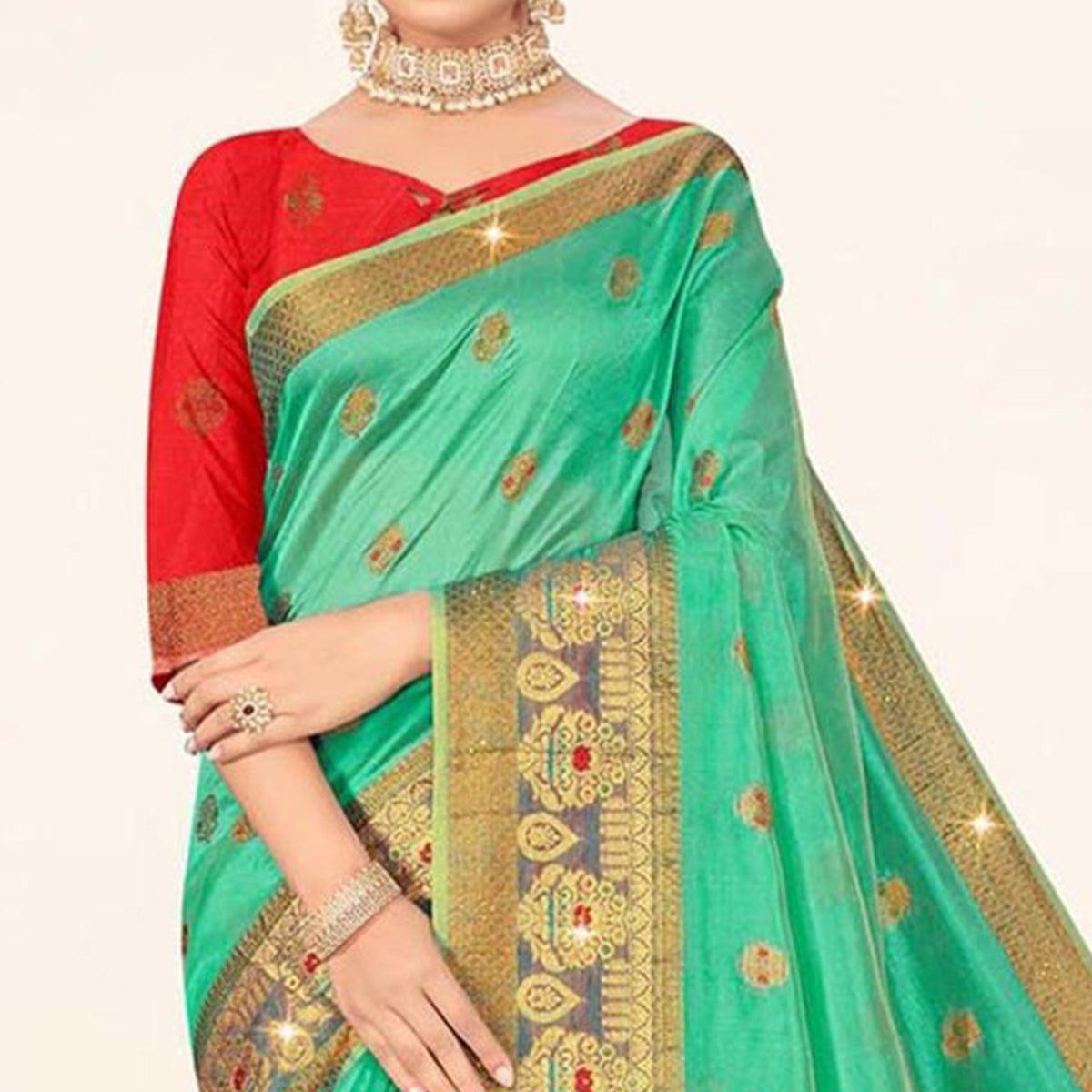 Turquoise Woven Organza Saree With Tassels