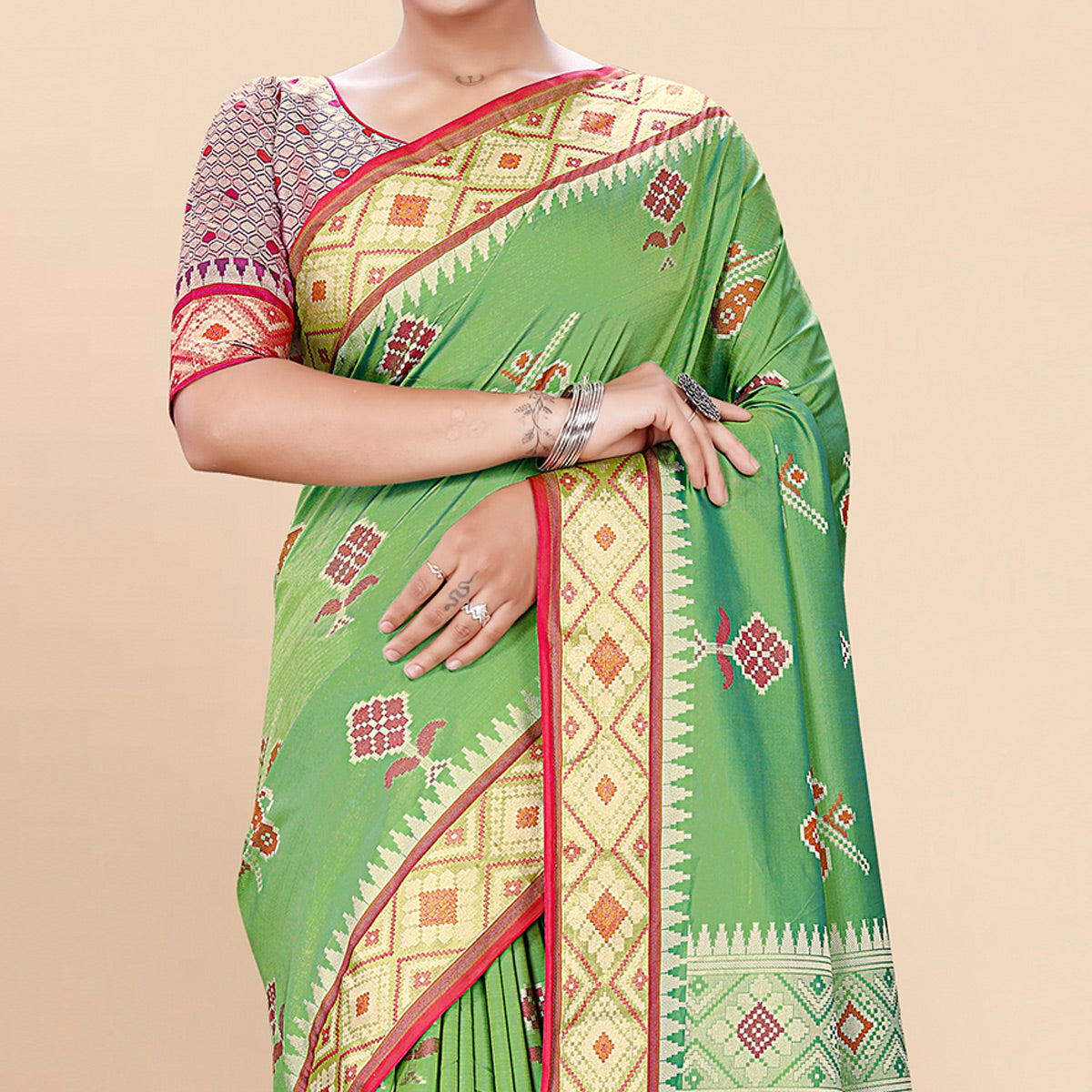 Green Woven Patola Art Silk Saree With Tassels