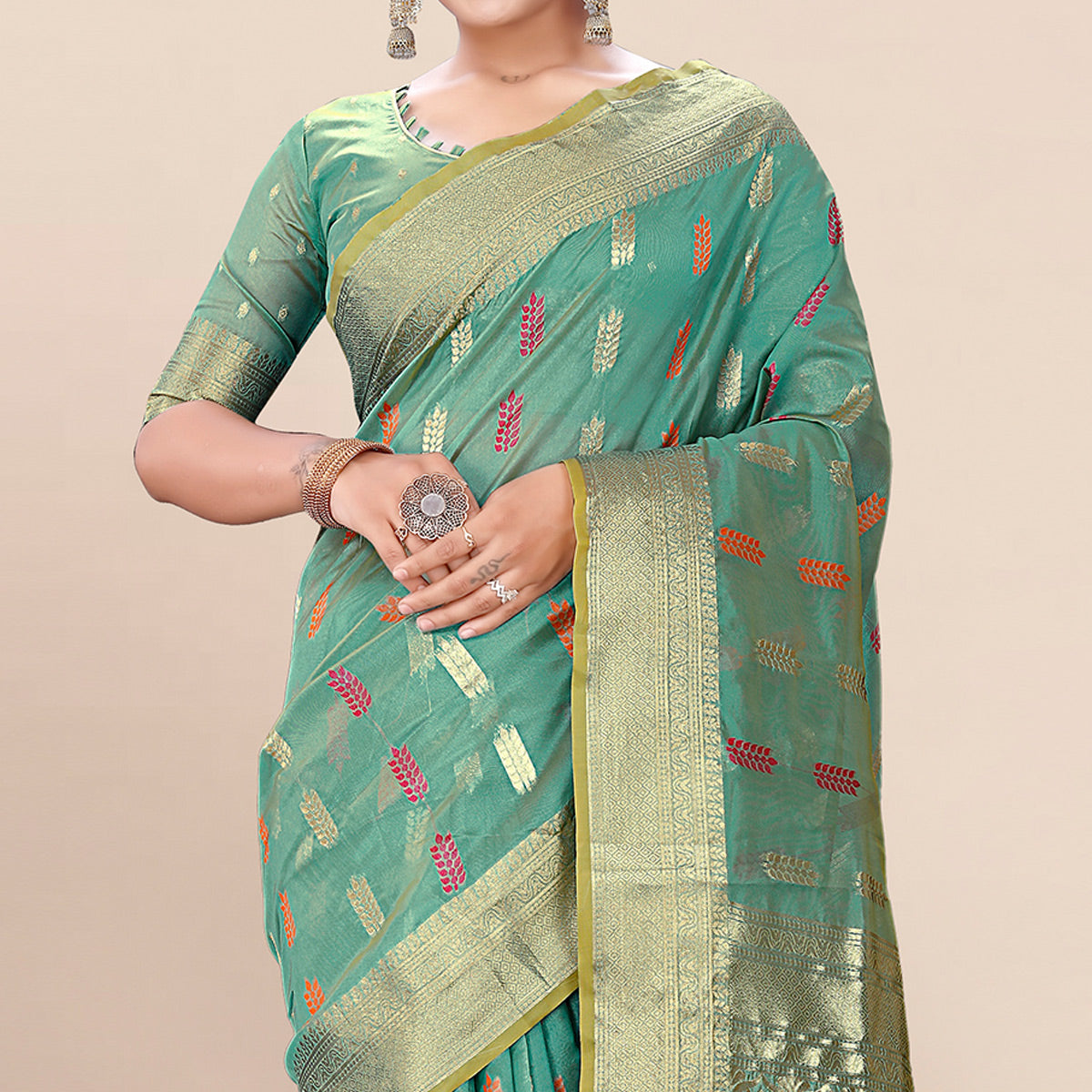 Rama Green Woven Organza Saree With Tassels