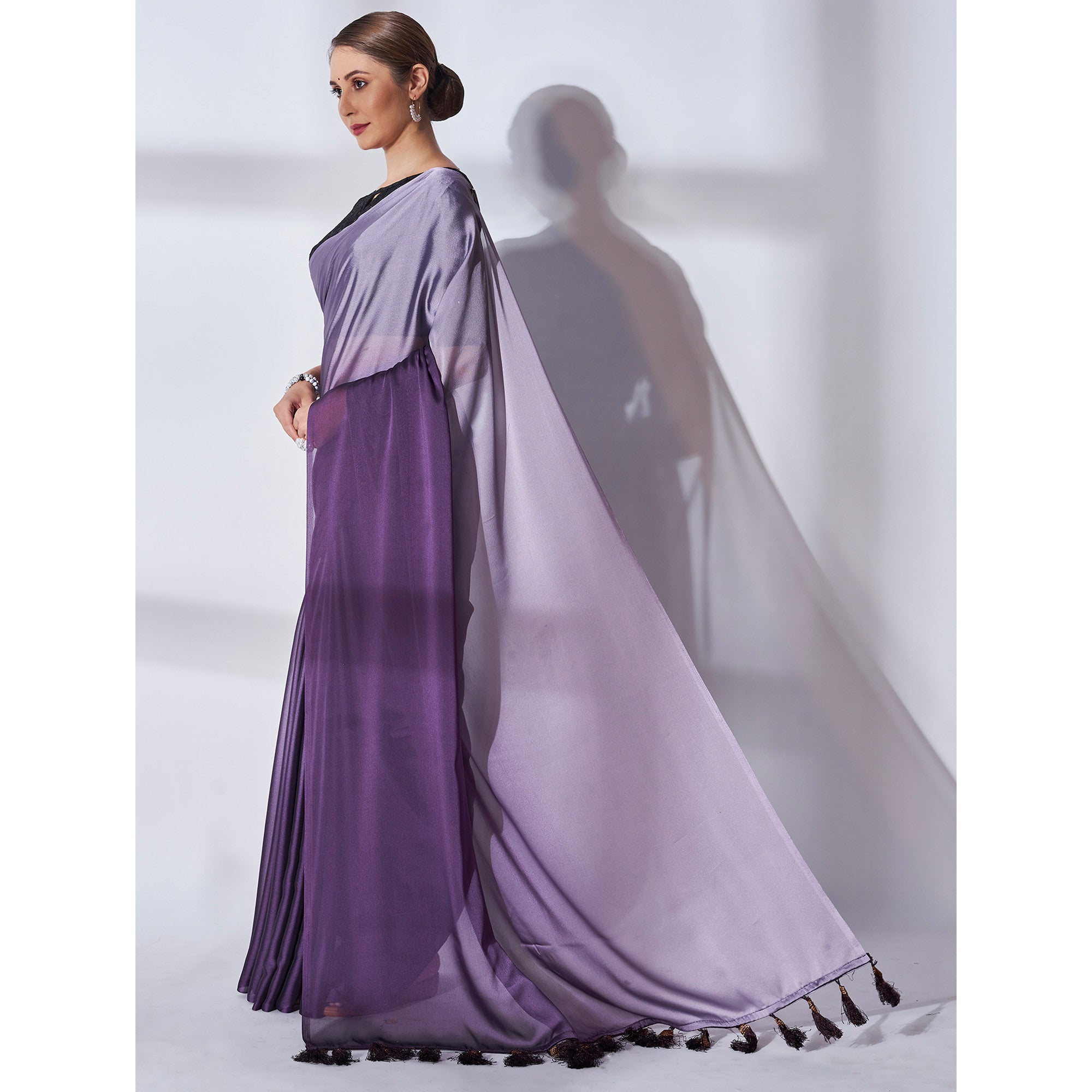 Purple Solid Georgette Saree With Tassels