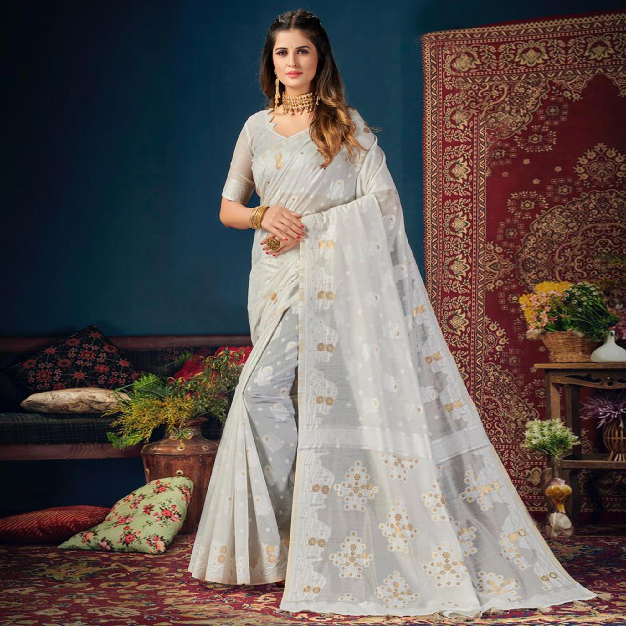 White Woven Cotton Blend Saree With Tassels