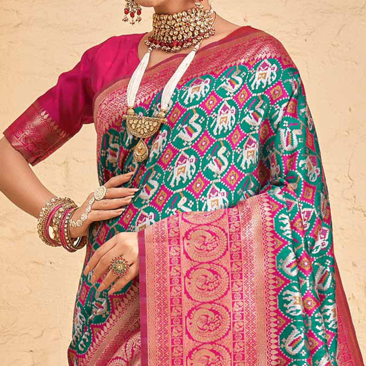 Rama Green Woven Patola Art Silk Saree With Tassels