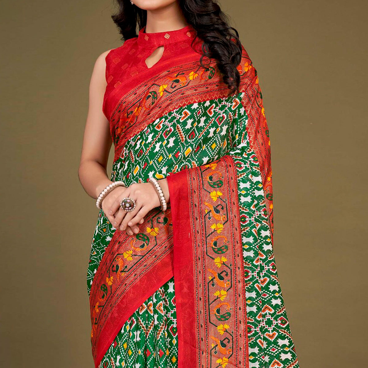 Green Printed Jute Patola Saree With Tassels