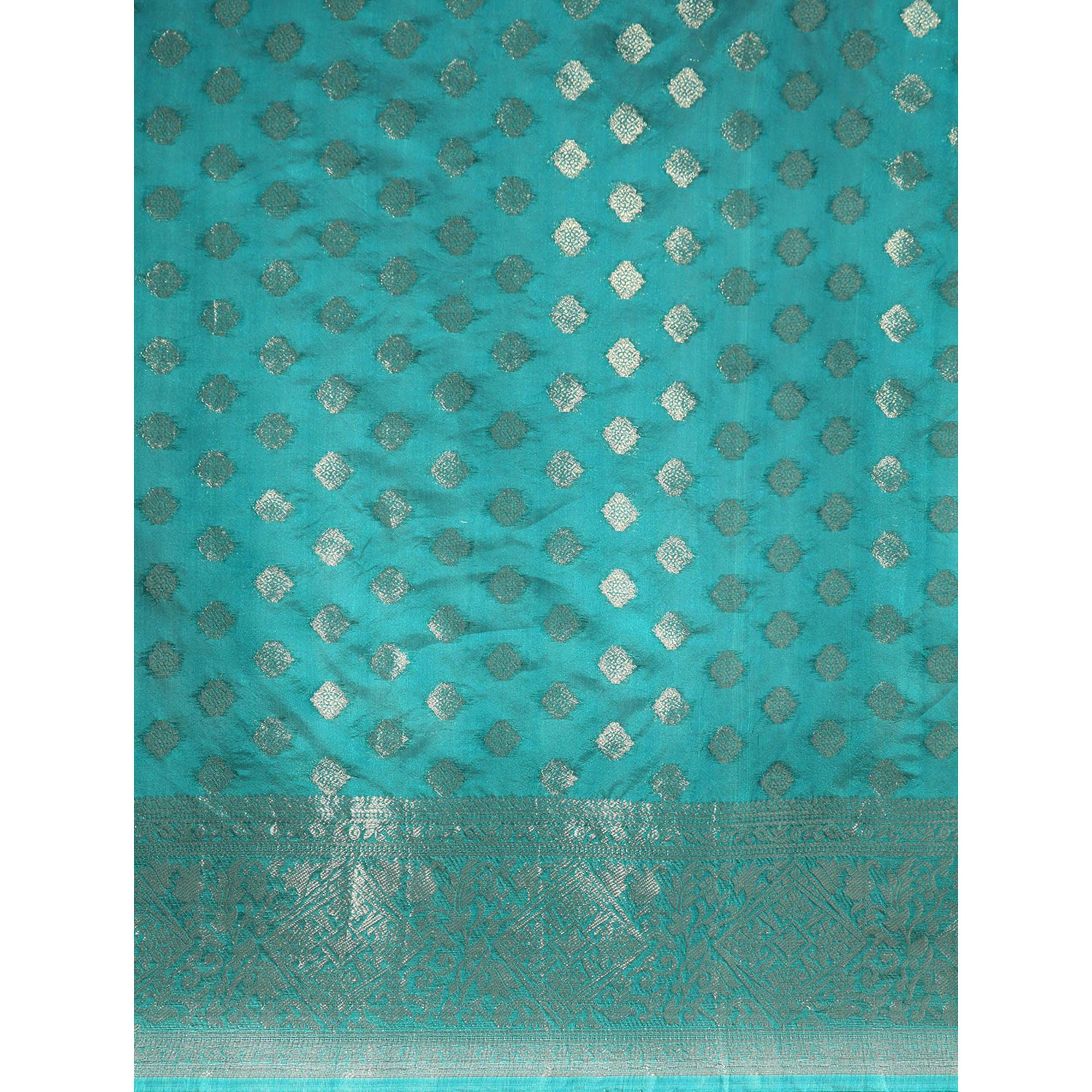Turquoise Woven Organza Silk Saree With Tassels