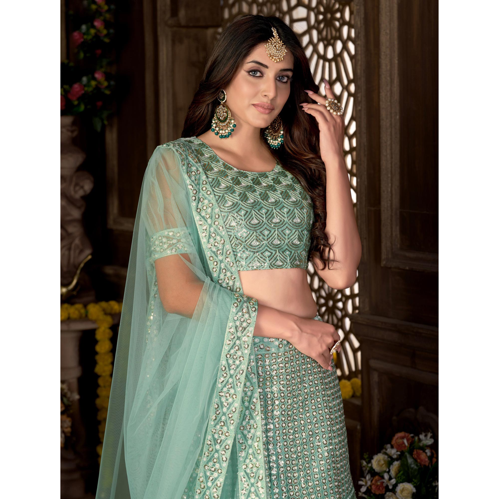 Sea Green Sequins Embroidered Netted Lehenga Choli