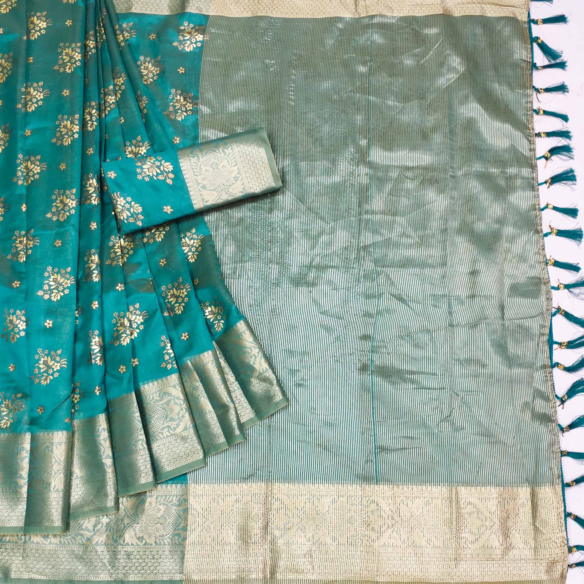 Rama Blue Woven Organza Saree With Tassels