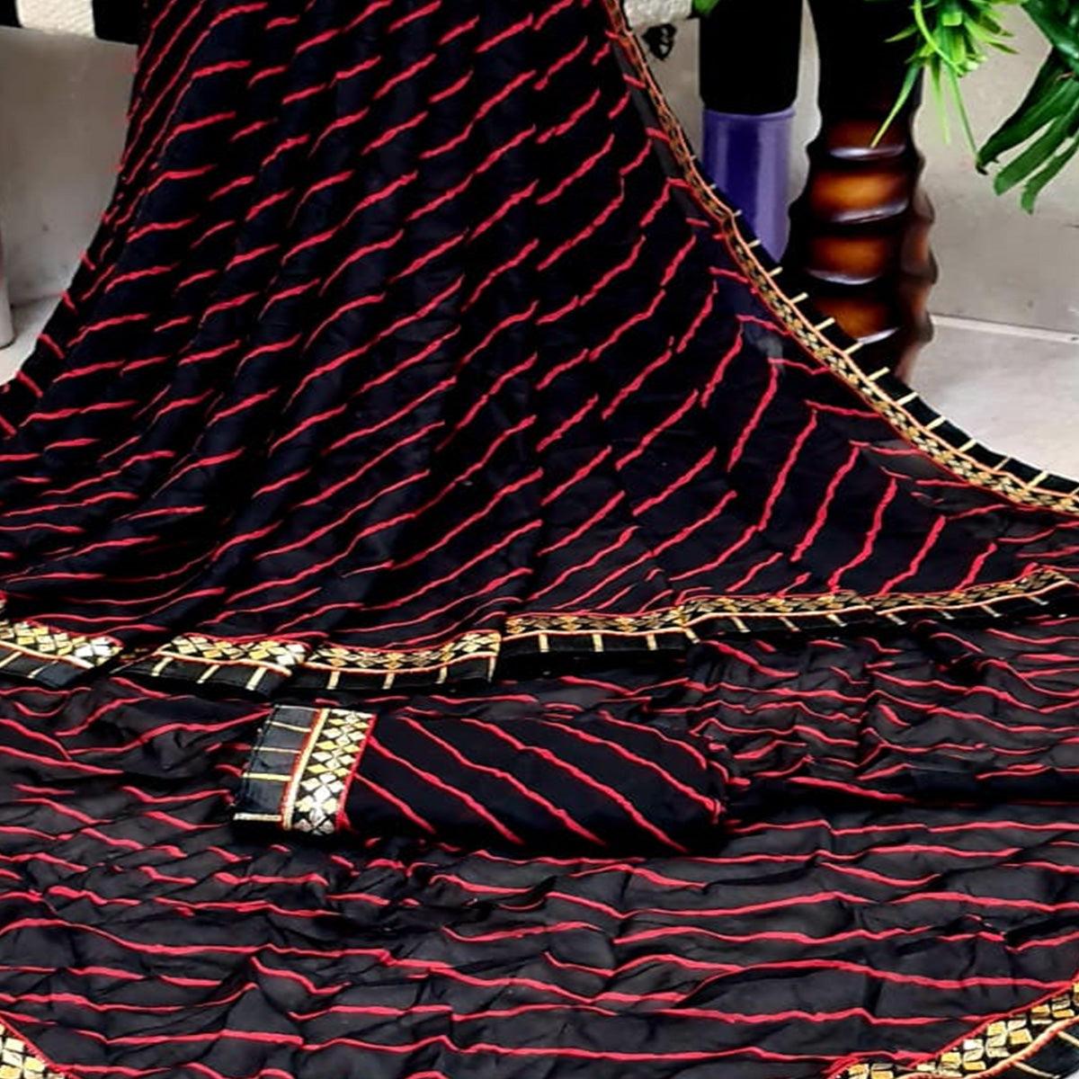 Flamboyant Black Colored Casual Printed Moss Georgette Saree - Peachmode