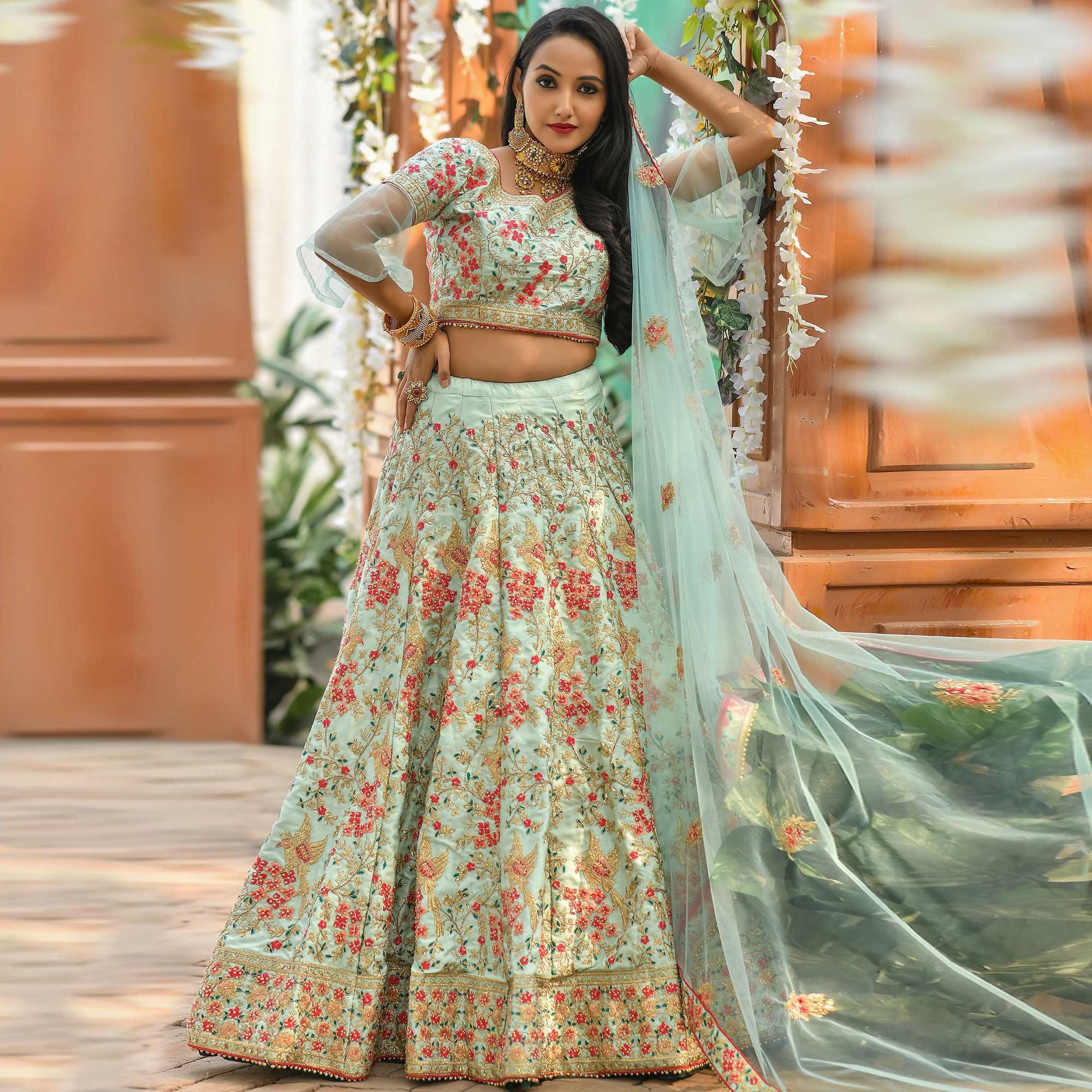 Flamboyant Blue Colored Wedding Wear Woven Silk Lehenga Choli - Peachmode