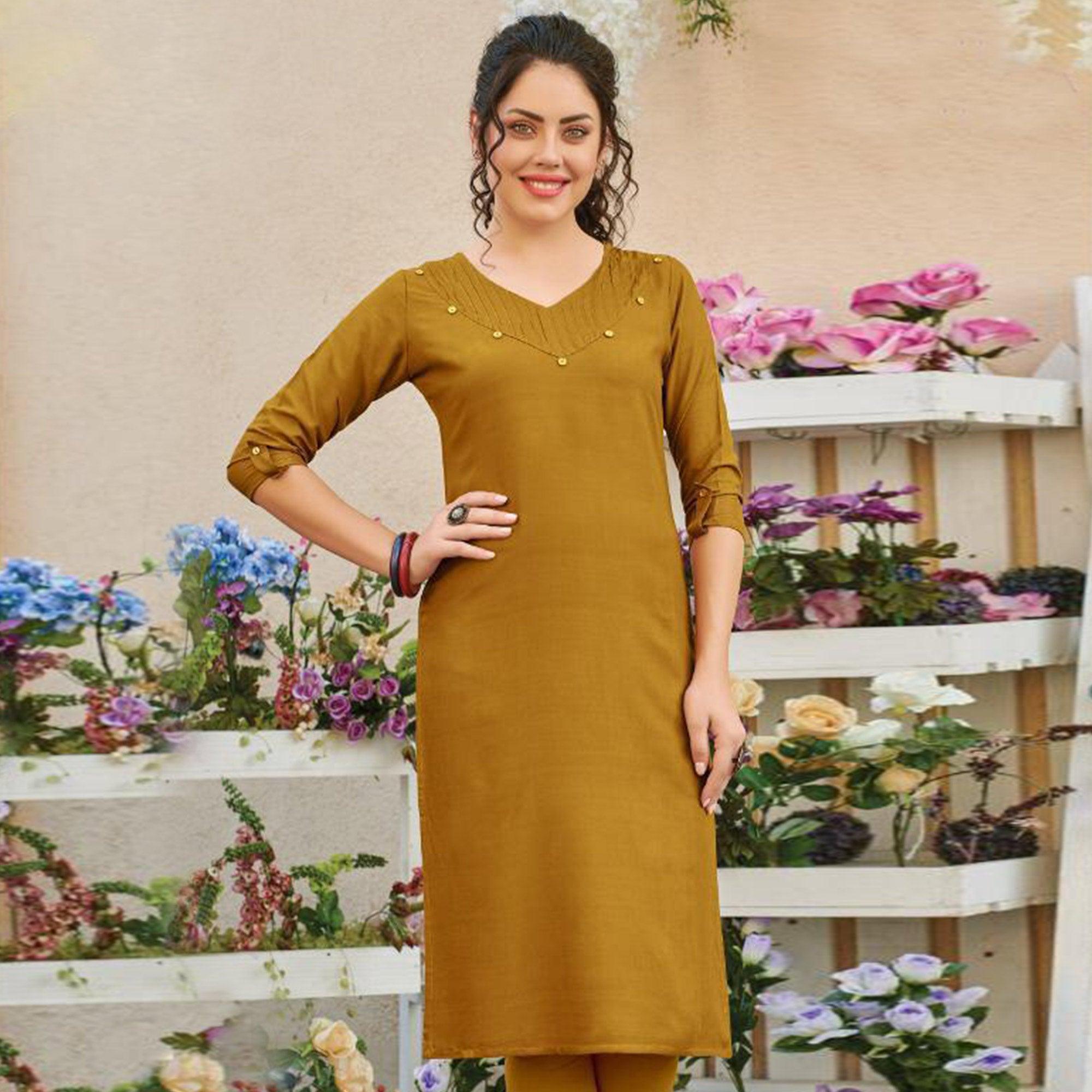 Flamboyant Mustard Yellow Colored Casual Wear Solid Pure Rayon Kurti - Peachmode