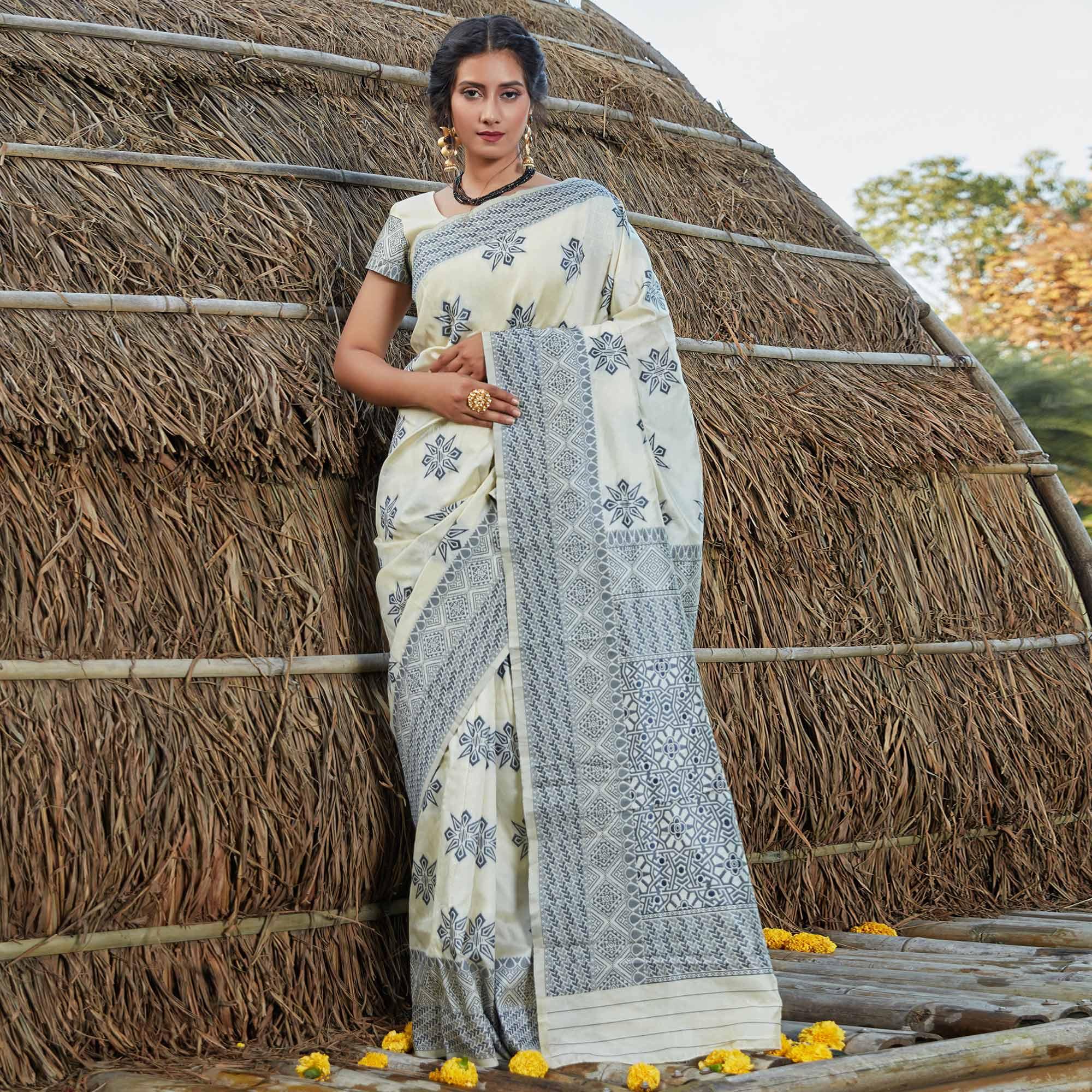 Flamboyant Offwhite Colored Festive Wear Woven Banarasi Silk Saree - Peachmode