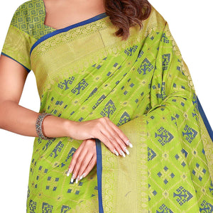 Flattering Green Colored Festive Wear Woven Patola Silk Saree - Peachmode